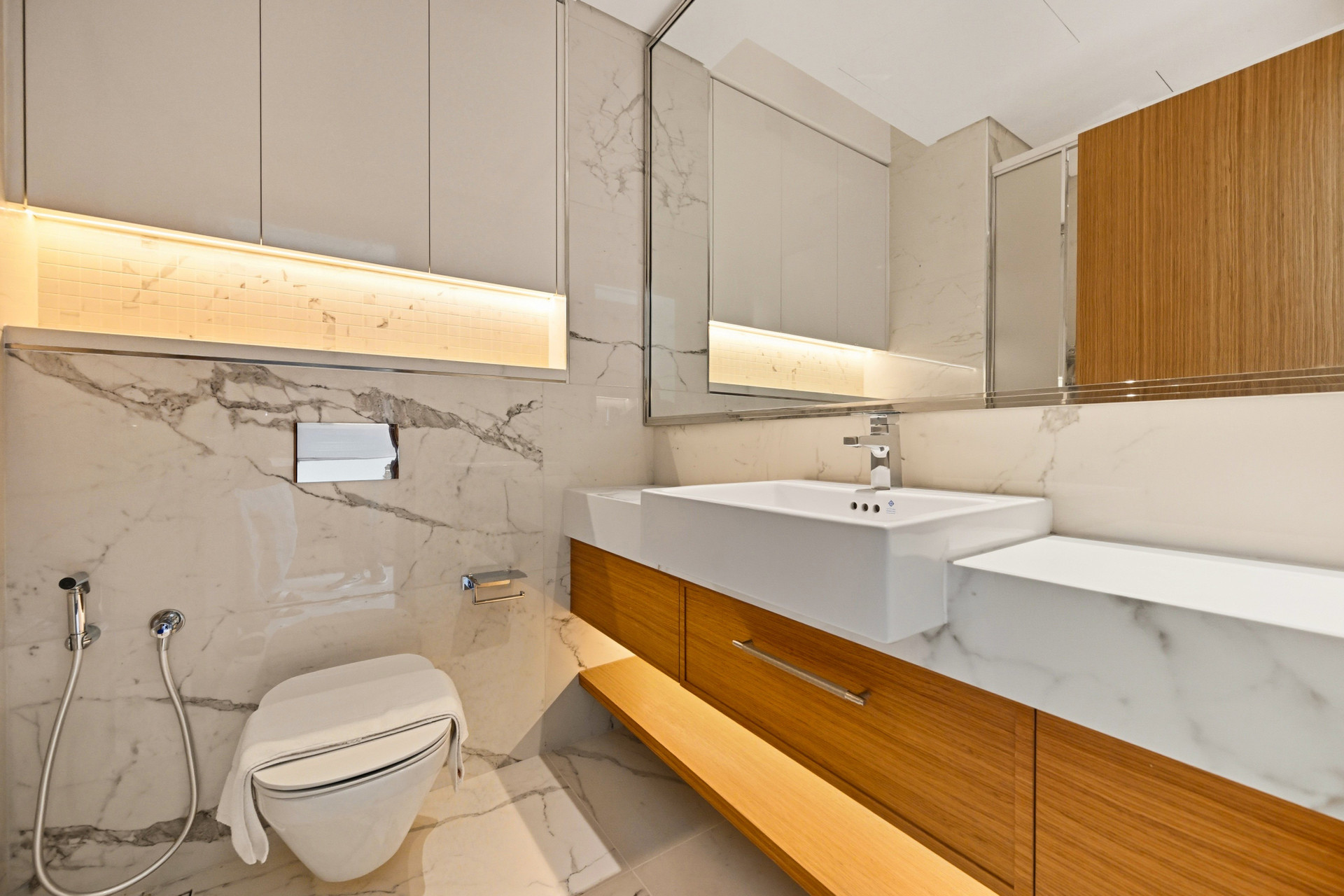 Bathroom with sink and toilet