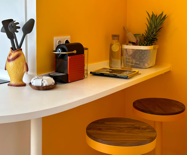 Orange kitchen counter with Nespresso
