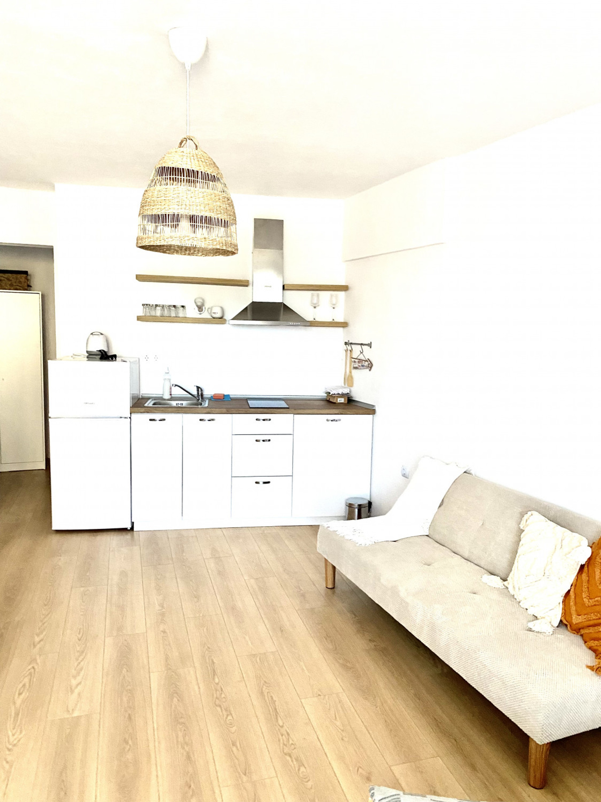 Open kitchen with sofa area