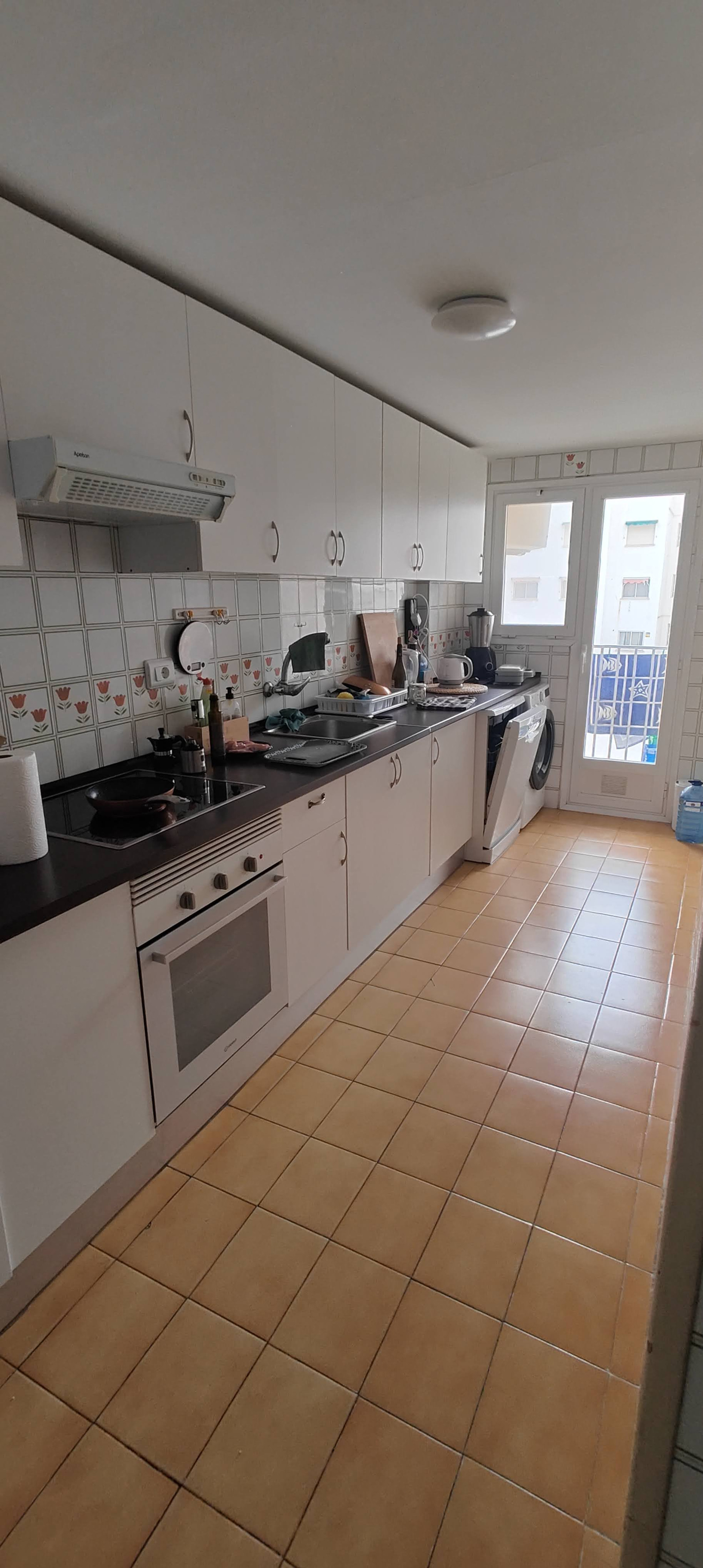 Full kitchen white cabinets oven