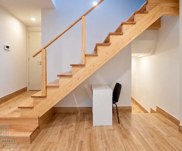 Wooden staircase with desk