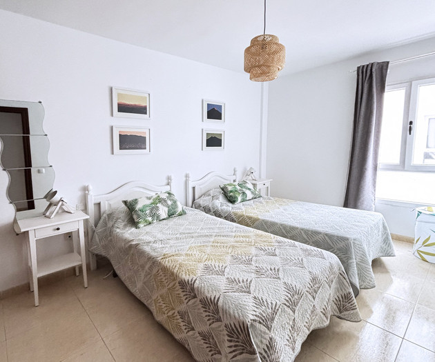 Twin bedroom with two beds