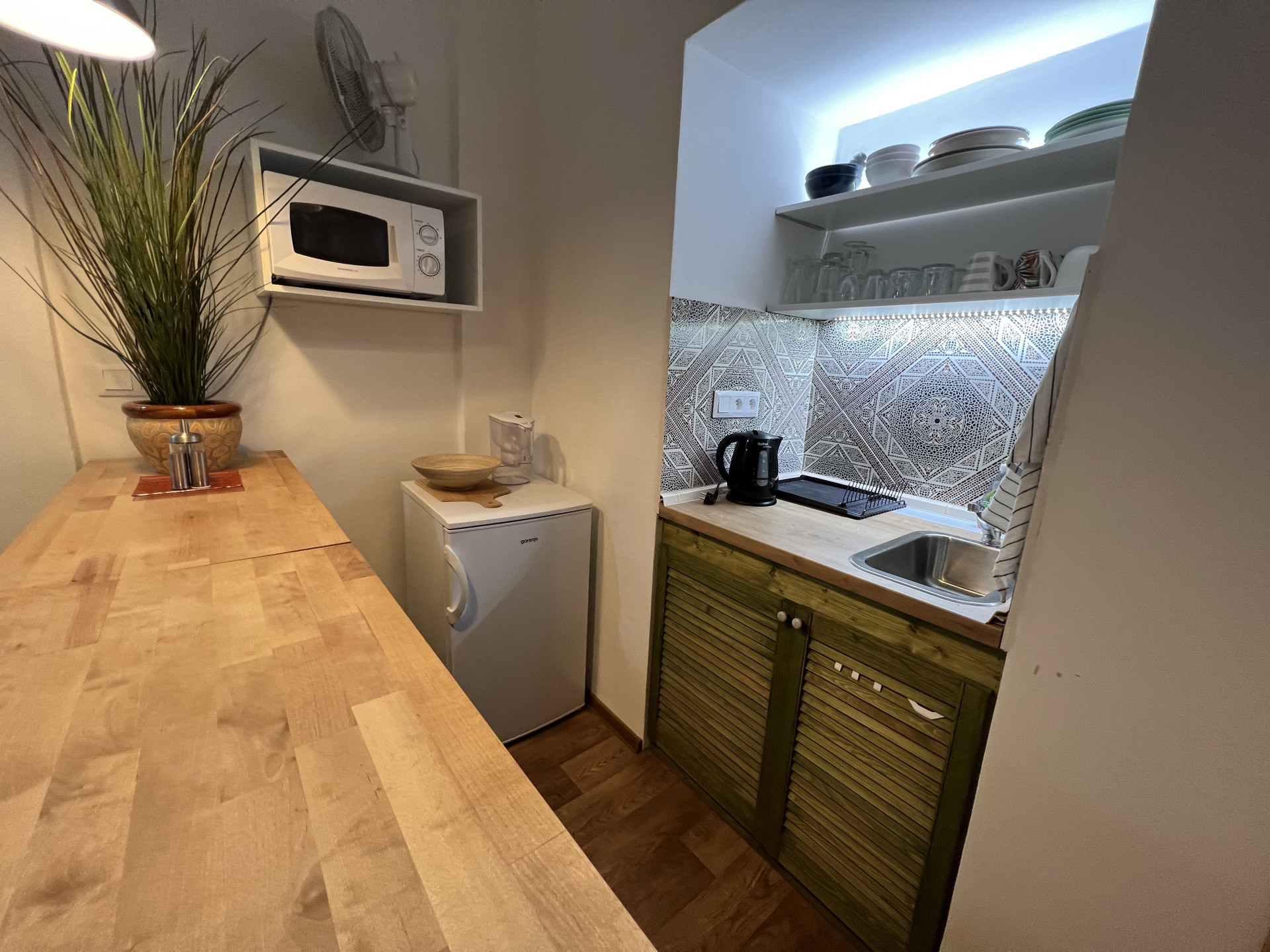 Kitchenette with sink and microwave
