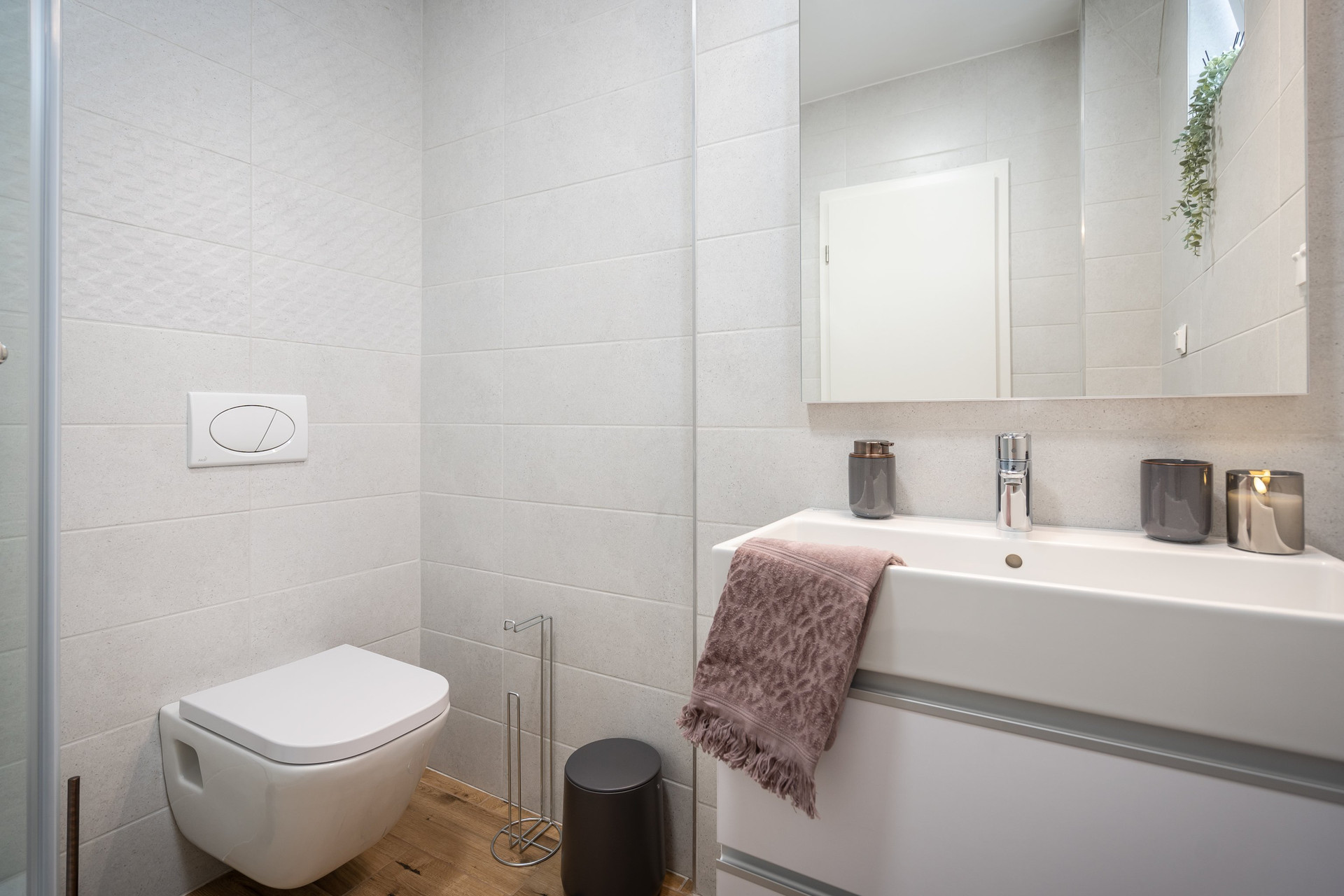 Clean bathroom with toilet and vanity