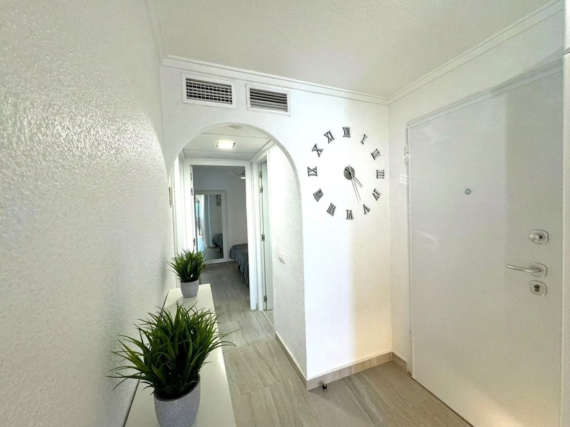 Hallway entrance with bedroom view