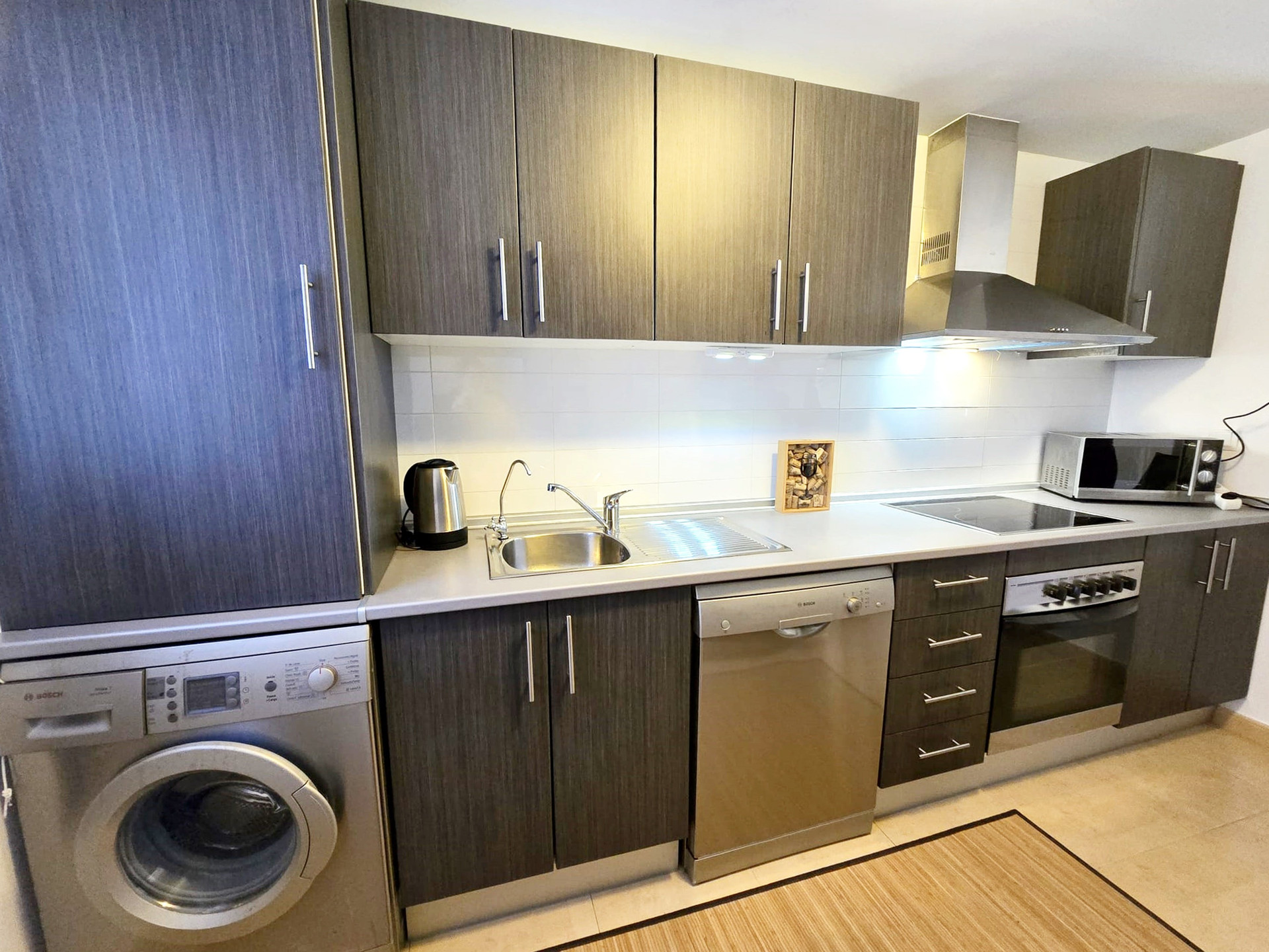 Kitchen with appliances and cabinets