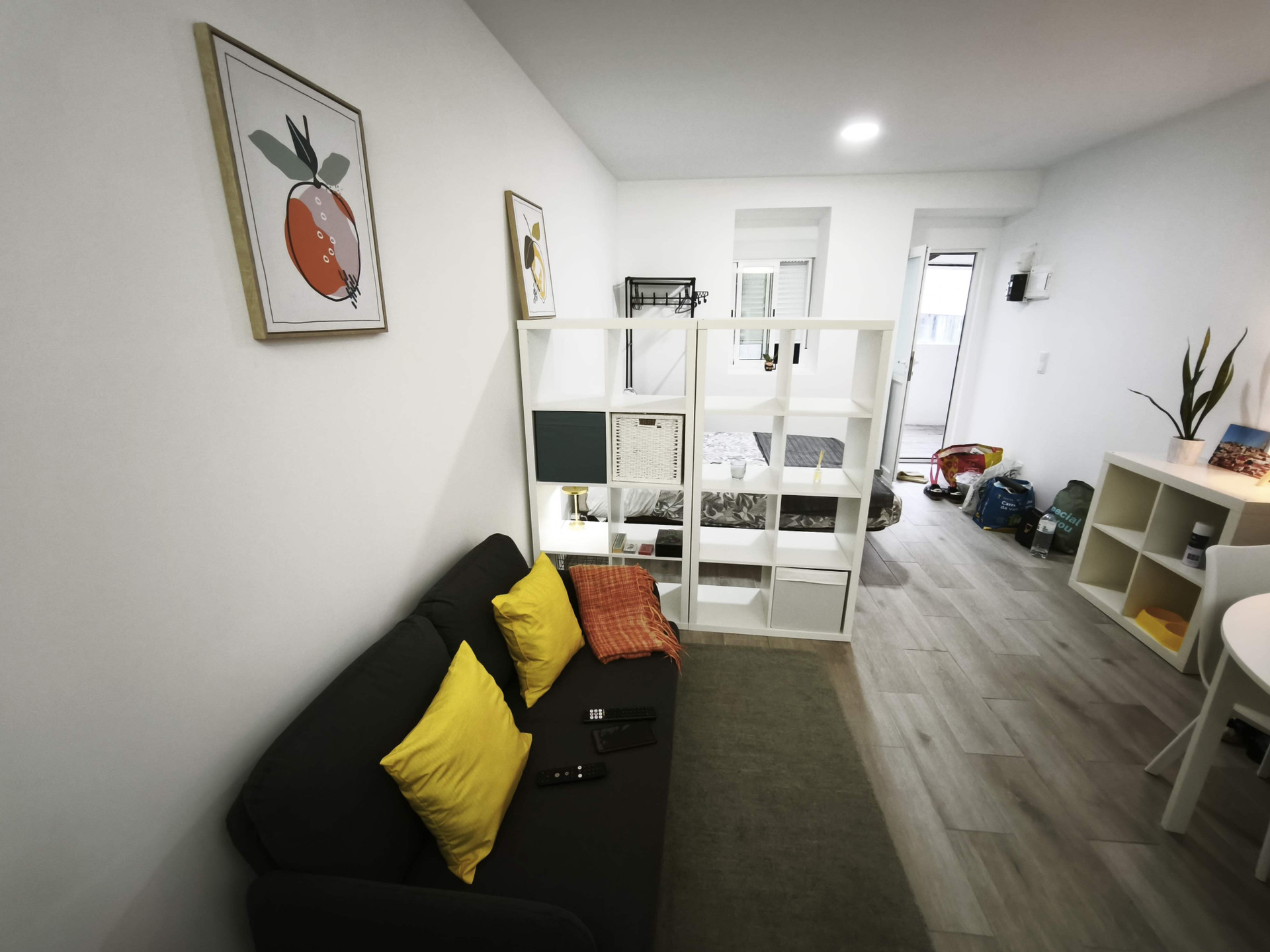 Living area with sofa and shelving