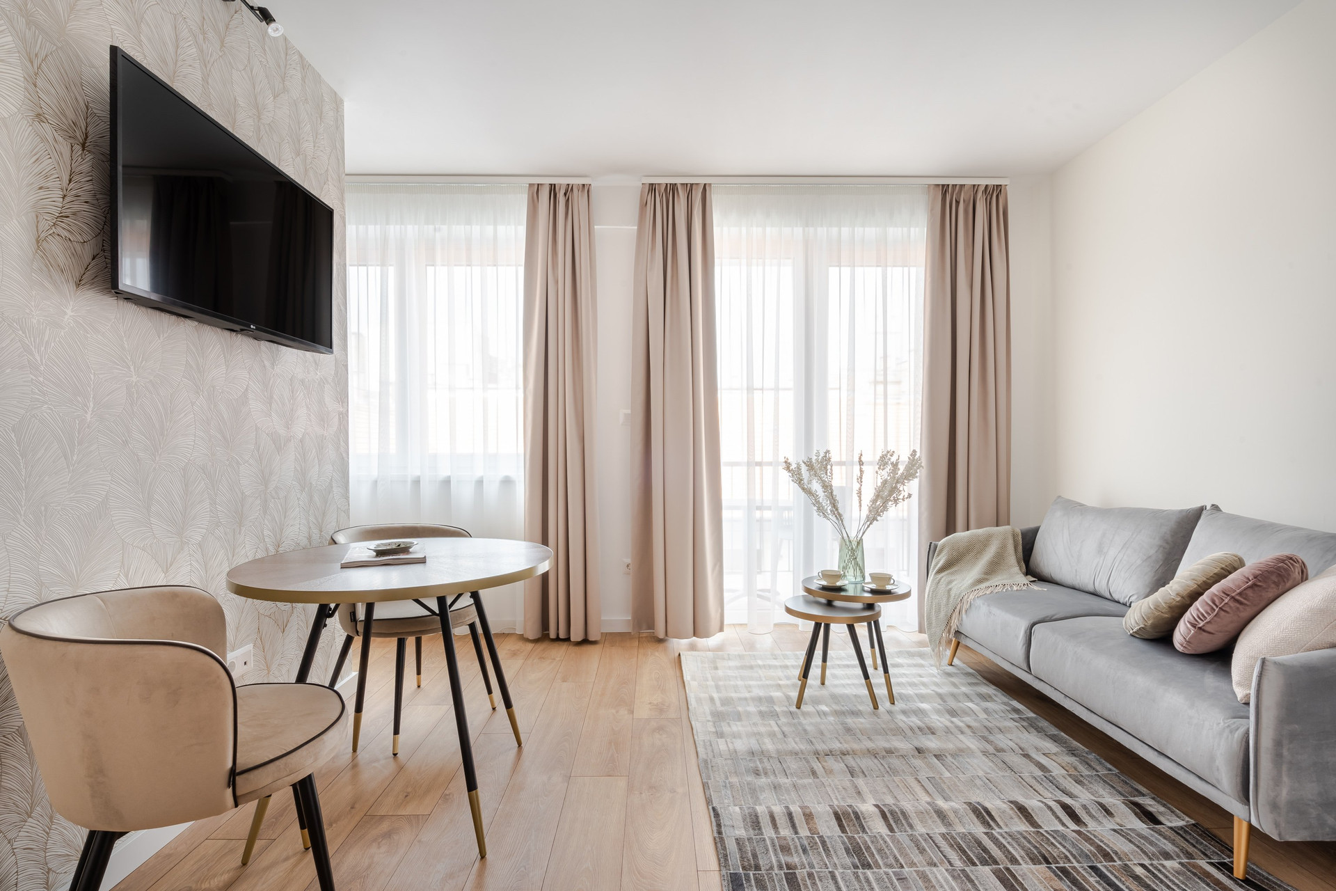 Bright living room with sofa dining