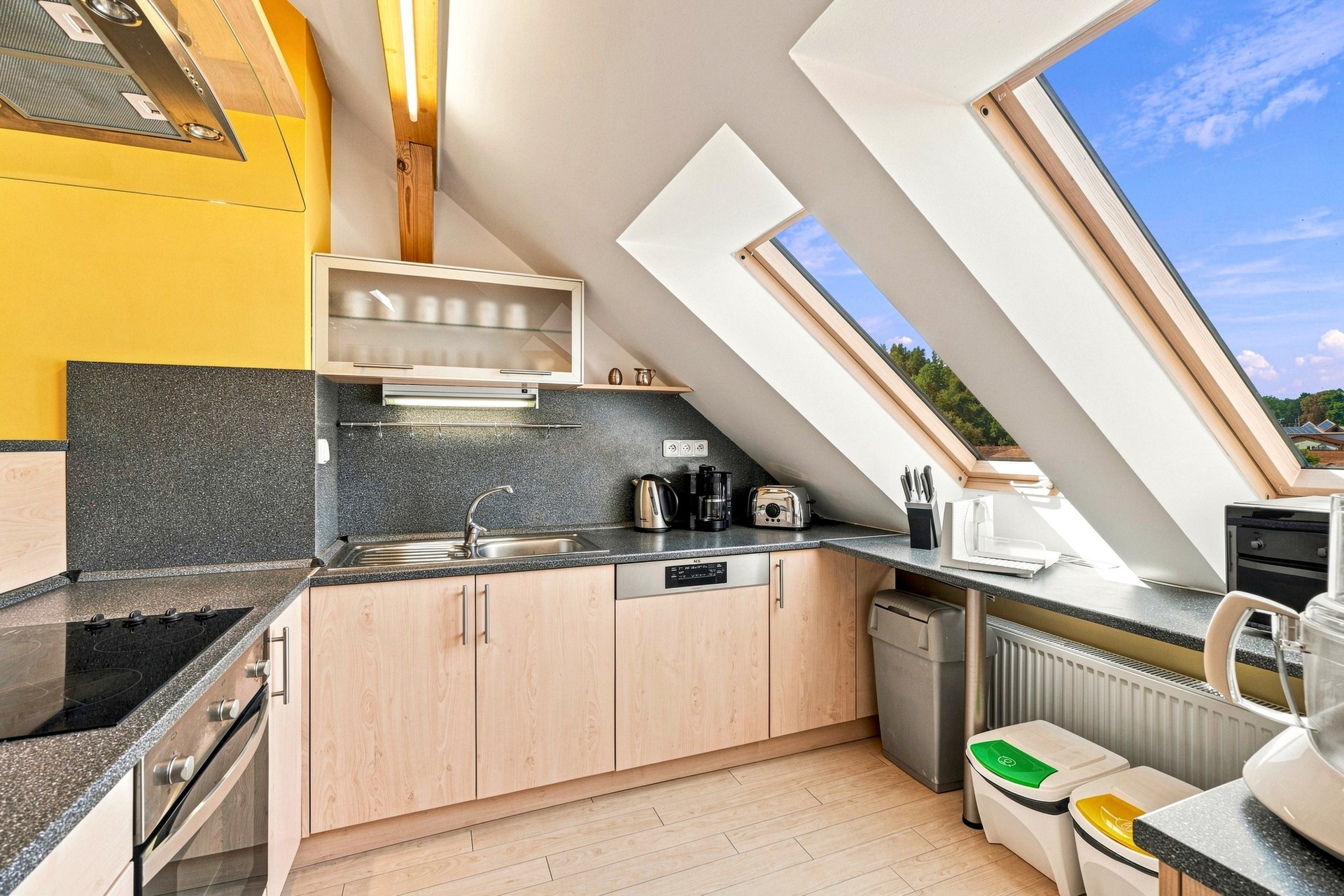 Attic kitchen with skylights
