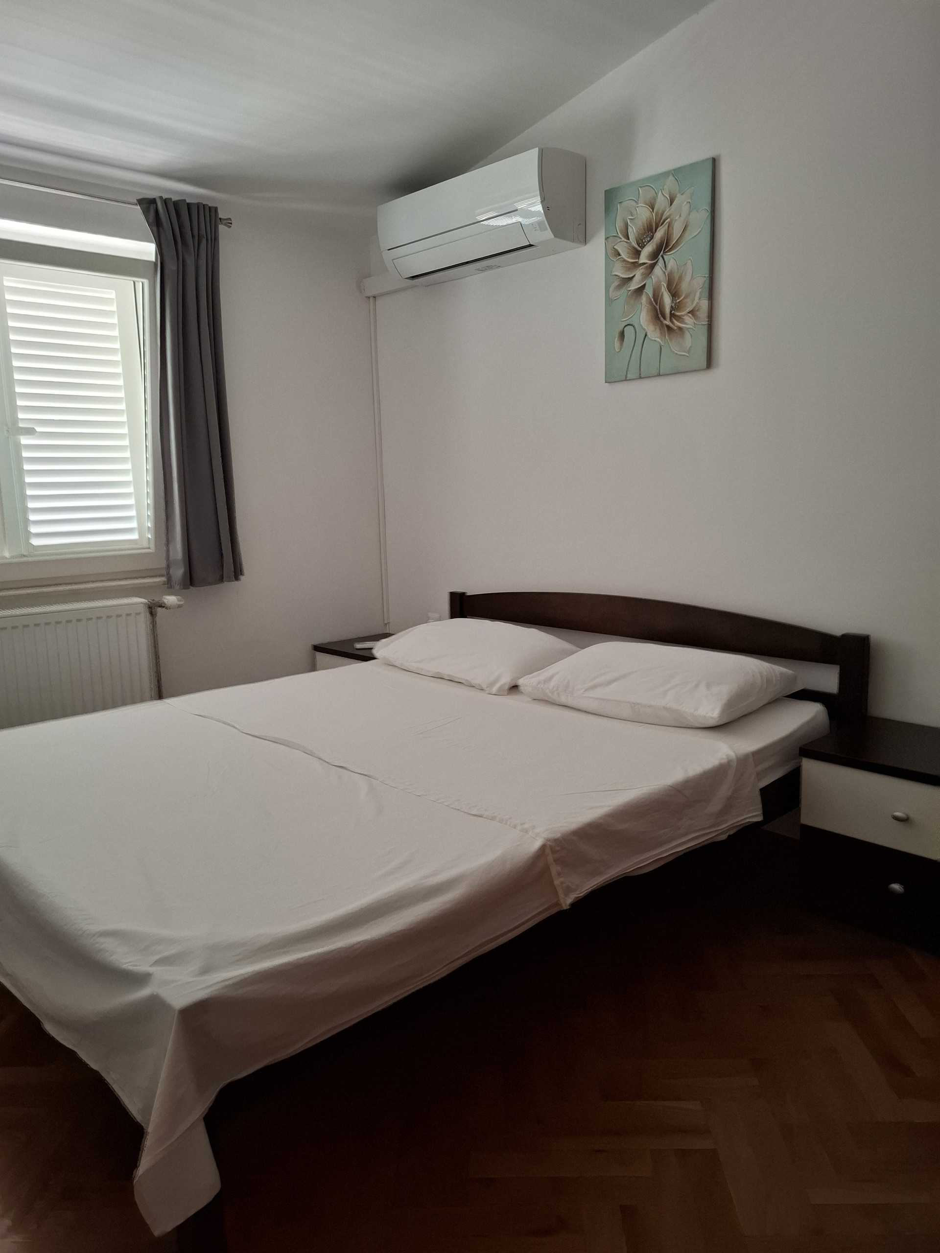 Bedroom bed with air conditioner