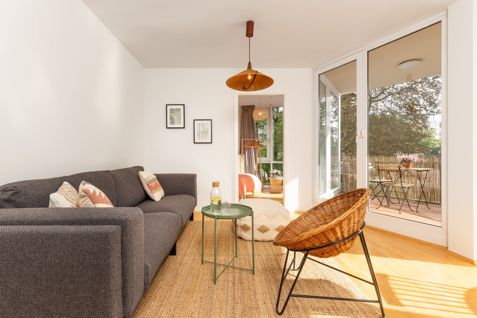 Plop yourself down in this calm and restful living room – while enjoying views of the park from floor-to-ceiling, wall-to-wall windows that fill the room with so much light