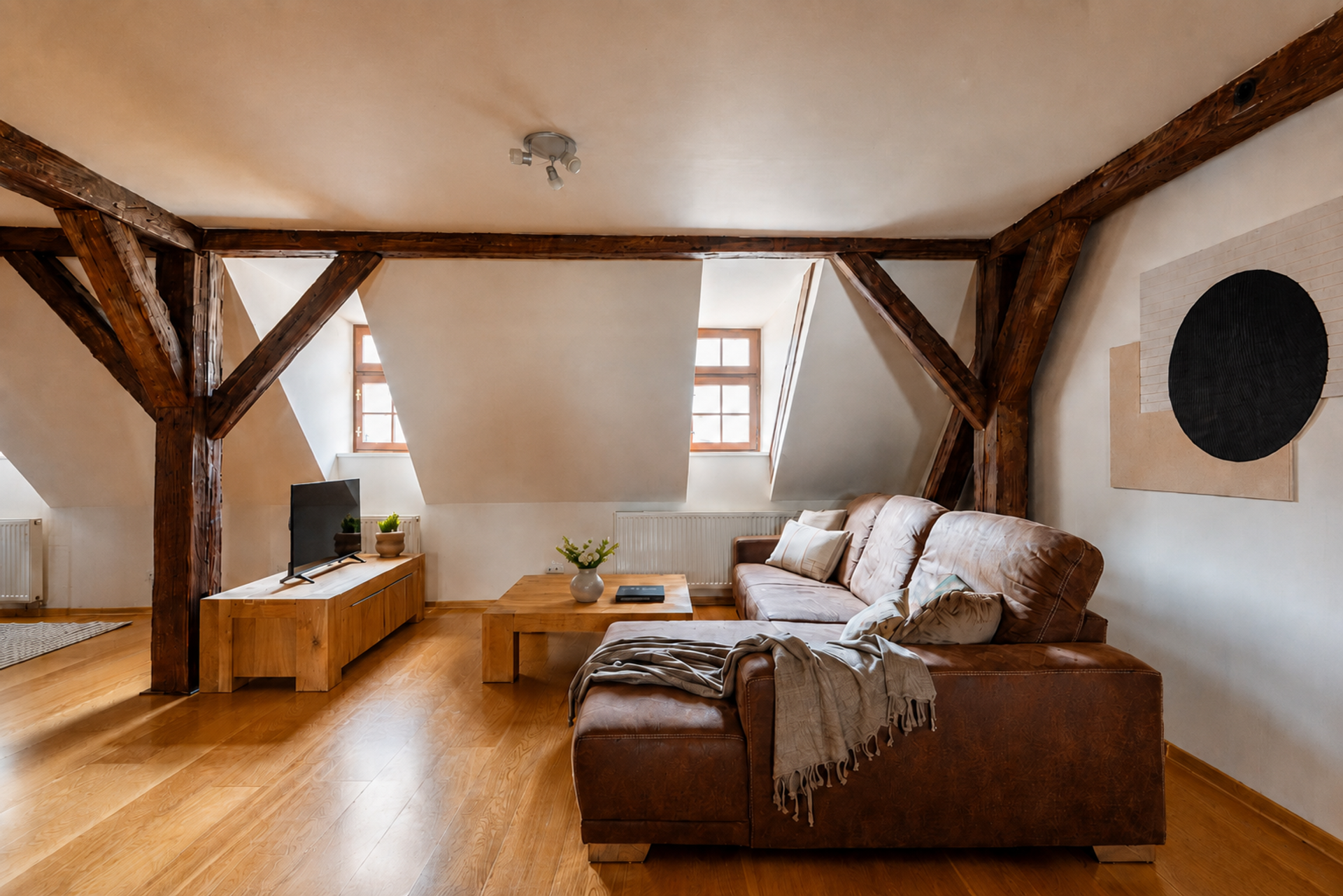 Living room with exposed wood beams