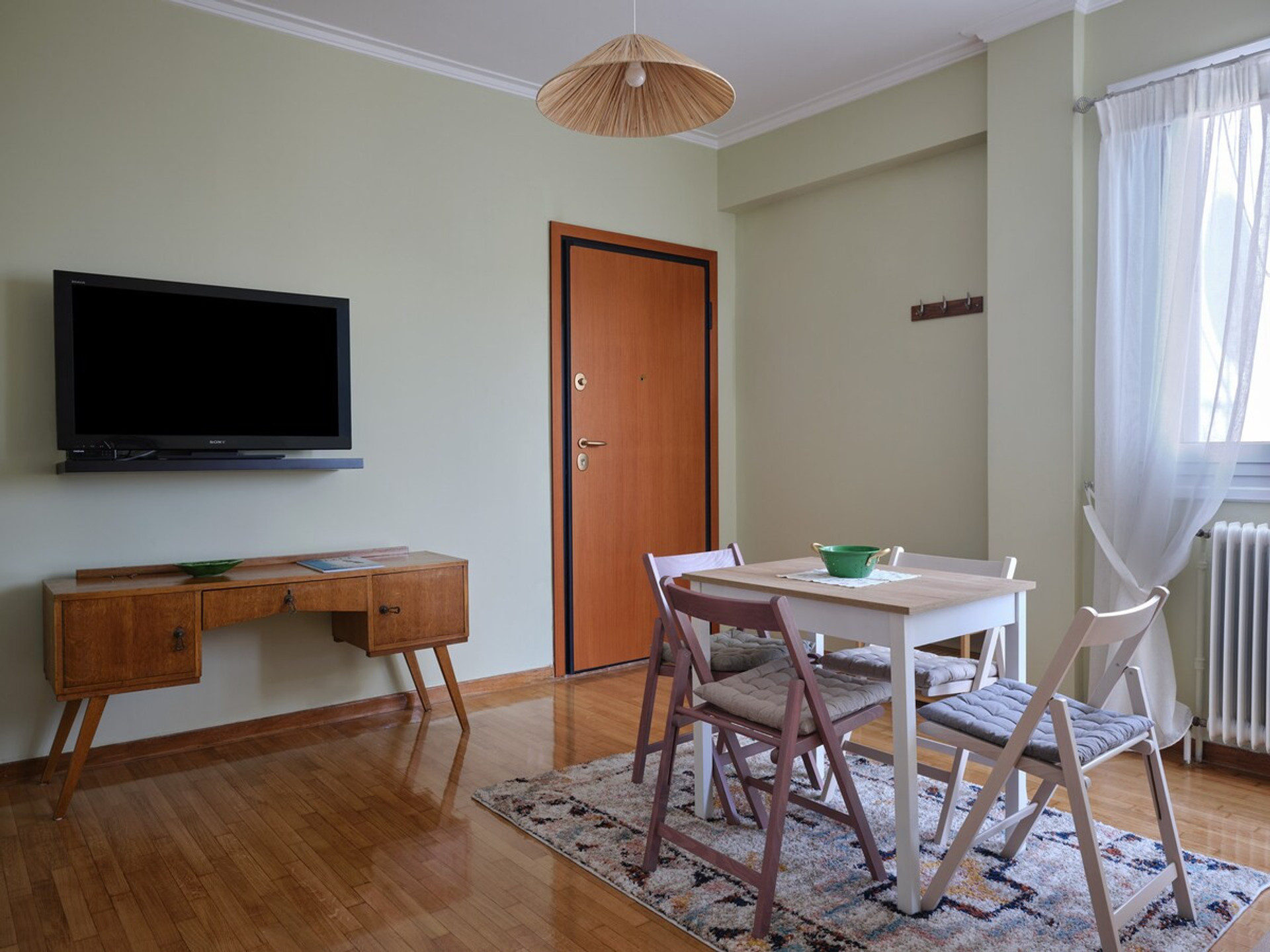 The living room with a dining table