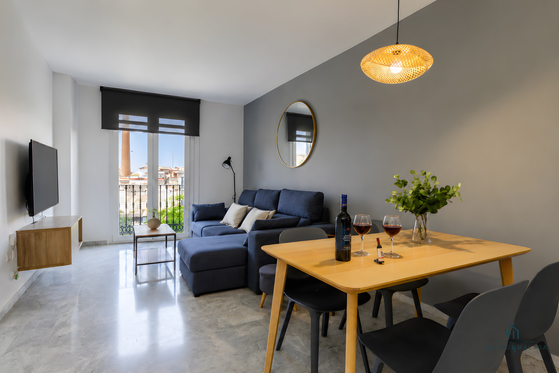 Living dining area with balcony view