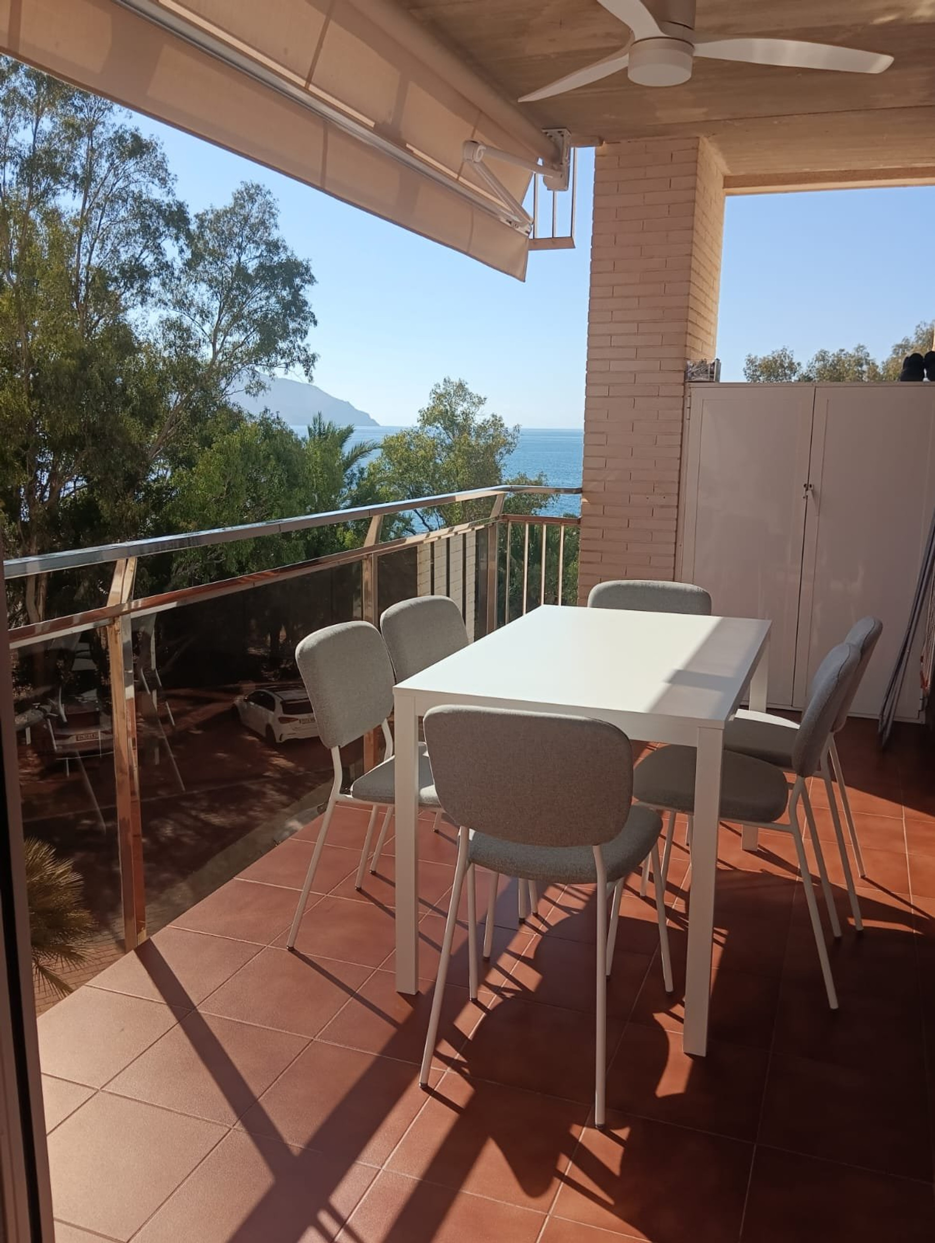 Balcony dining table with sea view