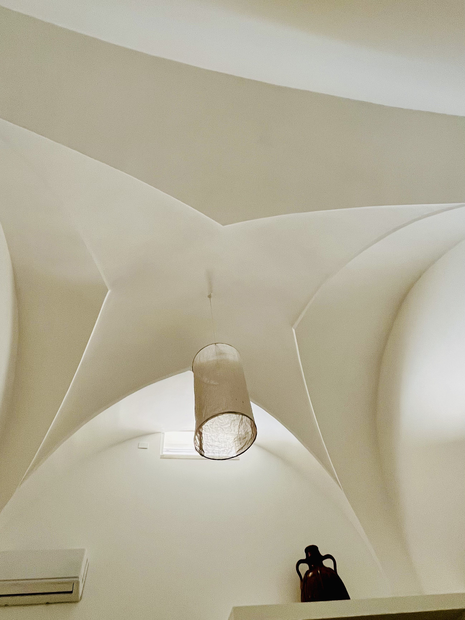Vaulted ceiling with pendant lamp