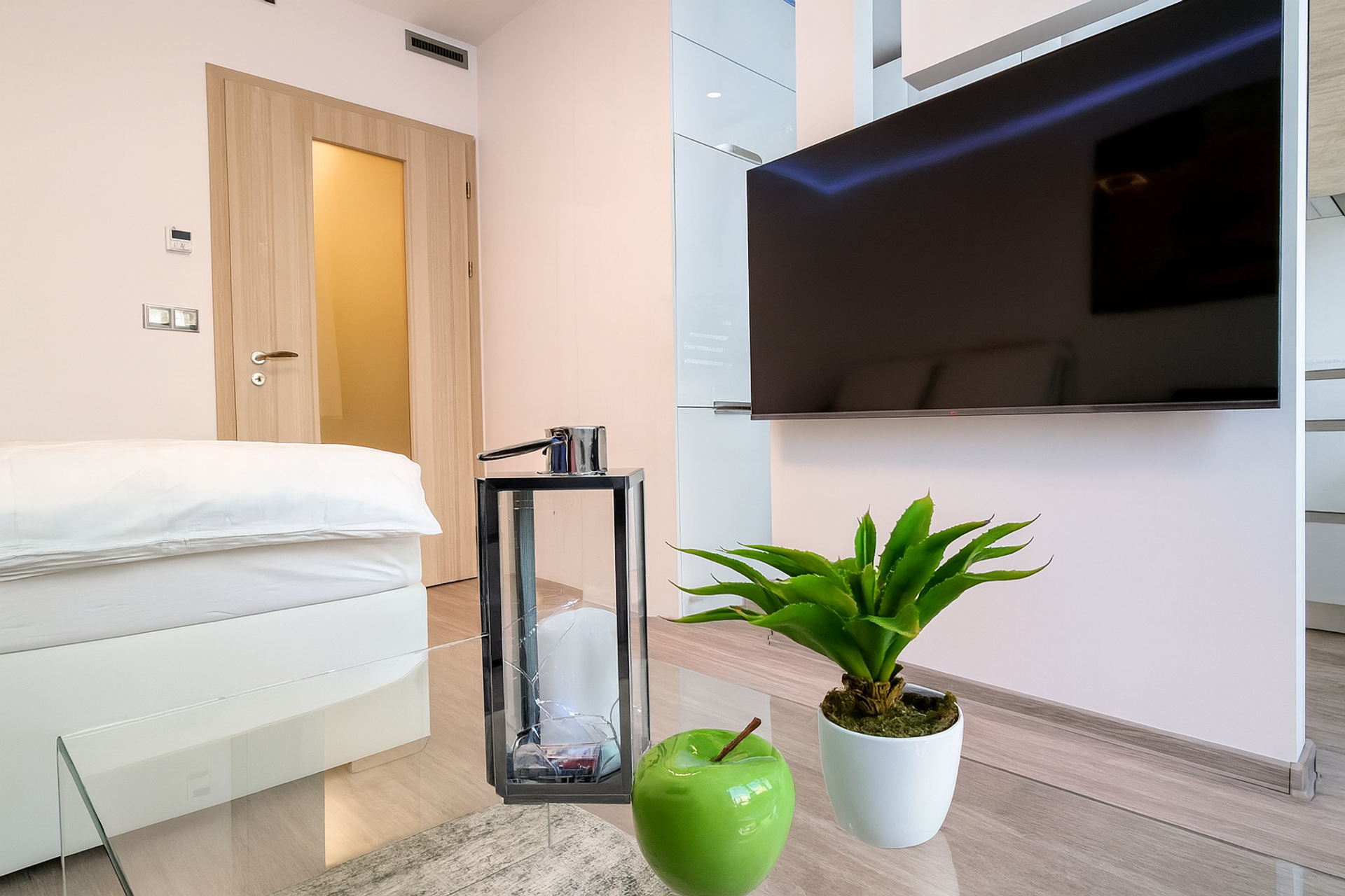 Bedroom with TV and decor