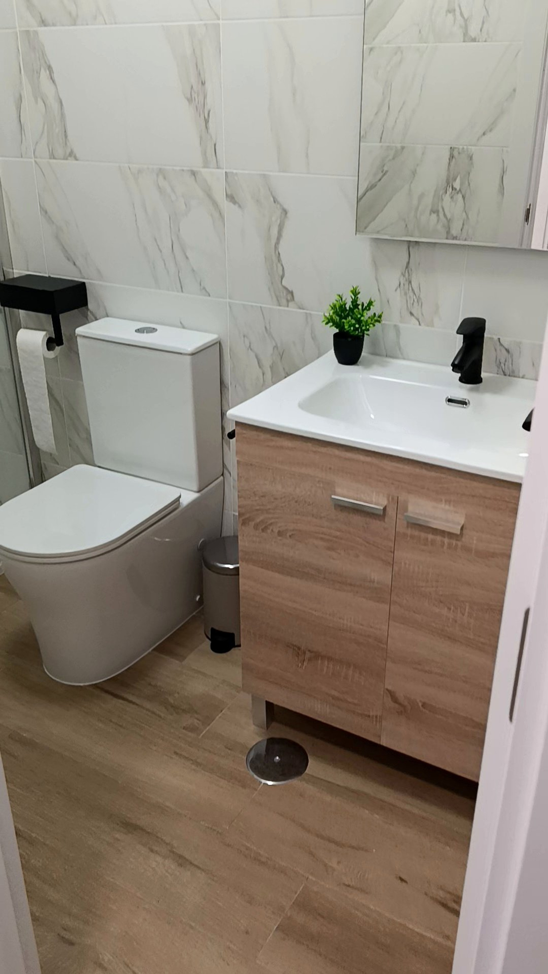 Bathroom with sink and toilet