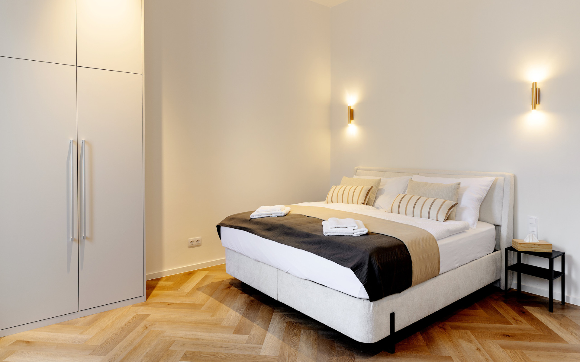 Double bedroom with wardrobe and lighting