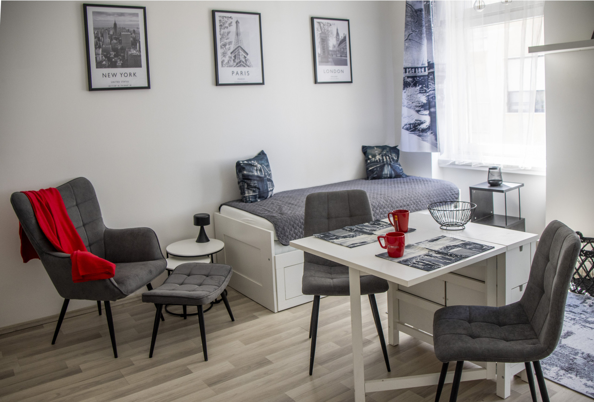 Living room with dining table and armchair
