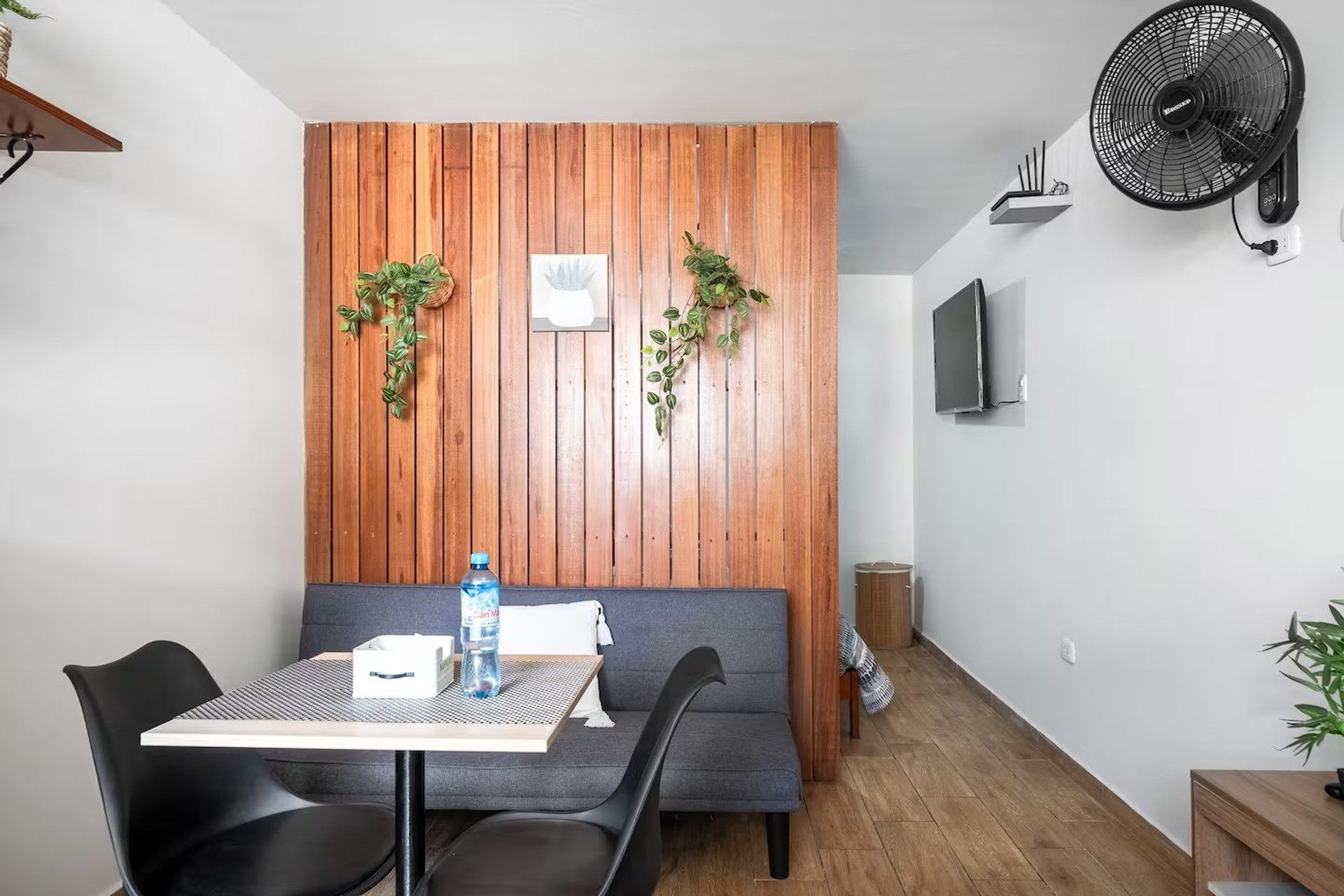 Dining nook with sofa and TV