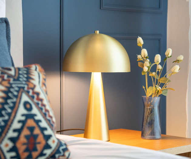 Gold lamp and flowers