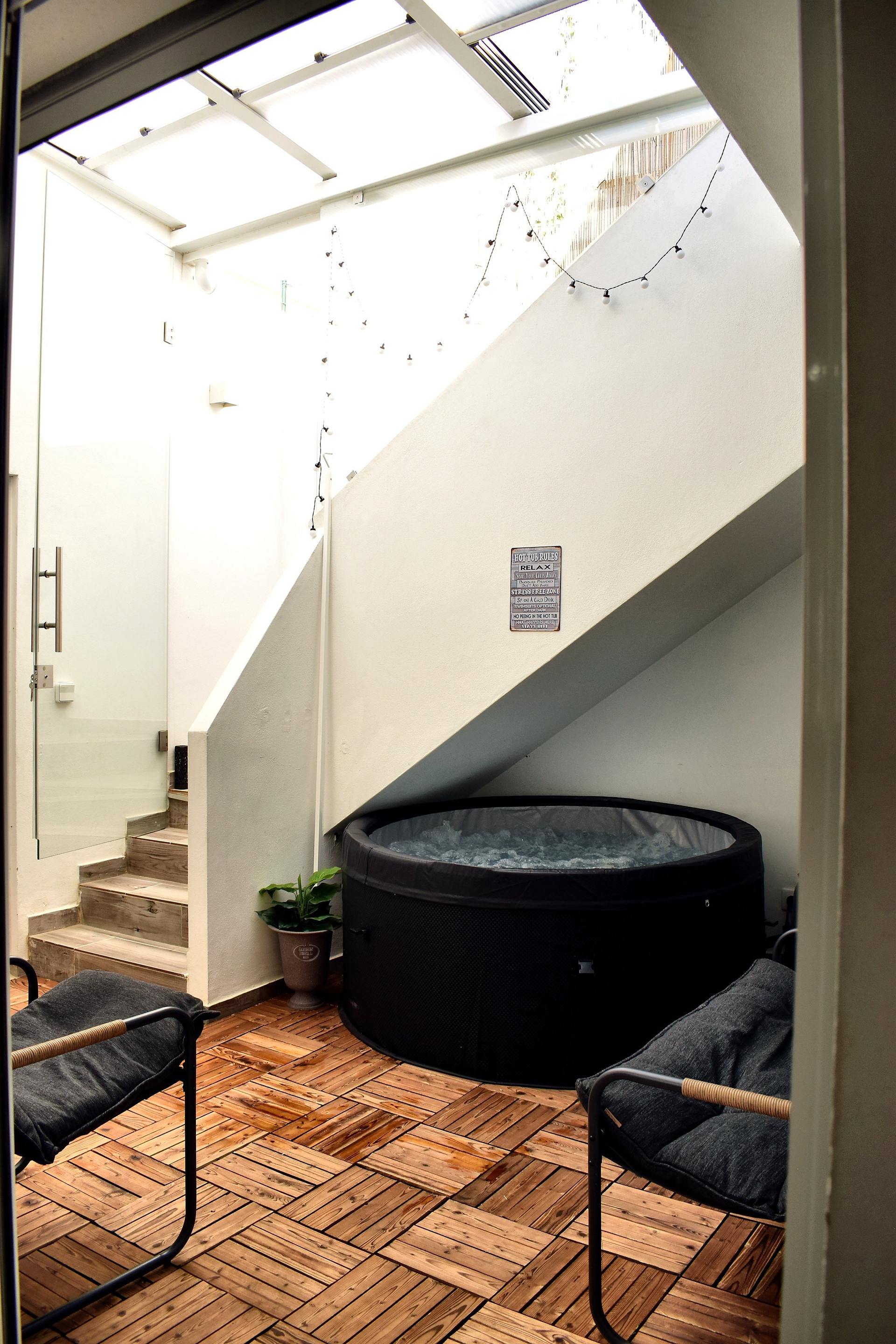 Hot tub under staircase