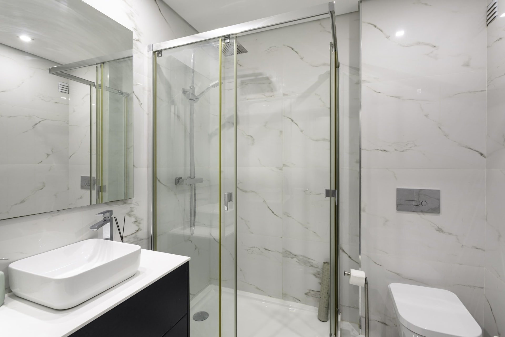 Marble bathroom with glass shower