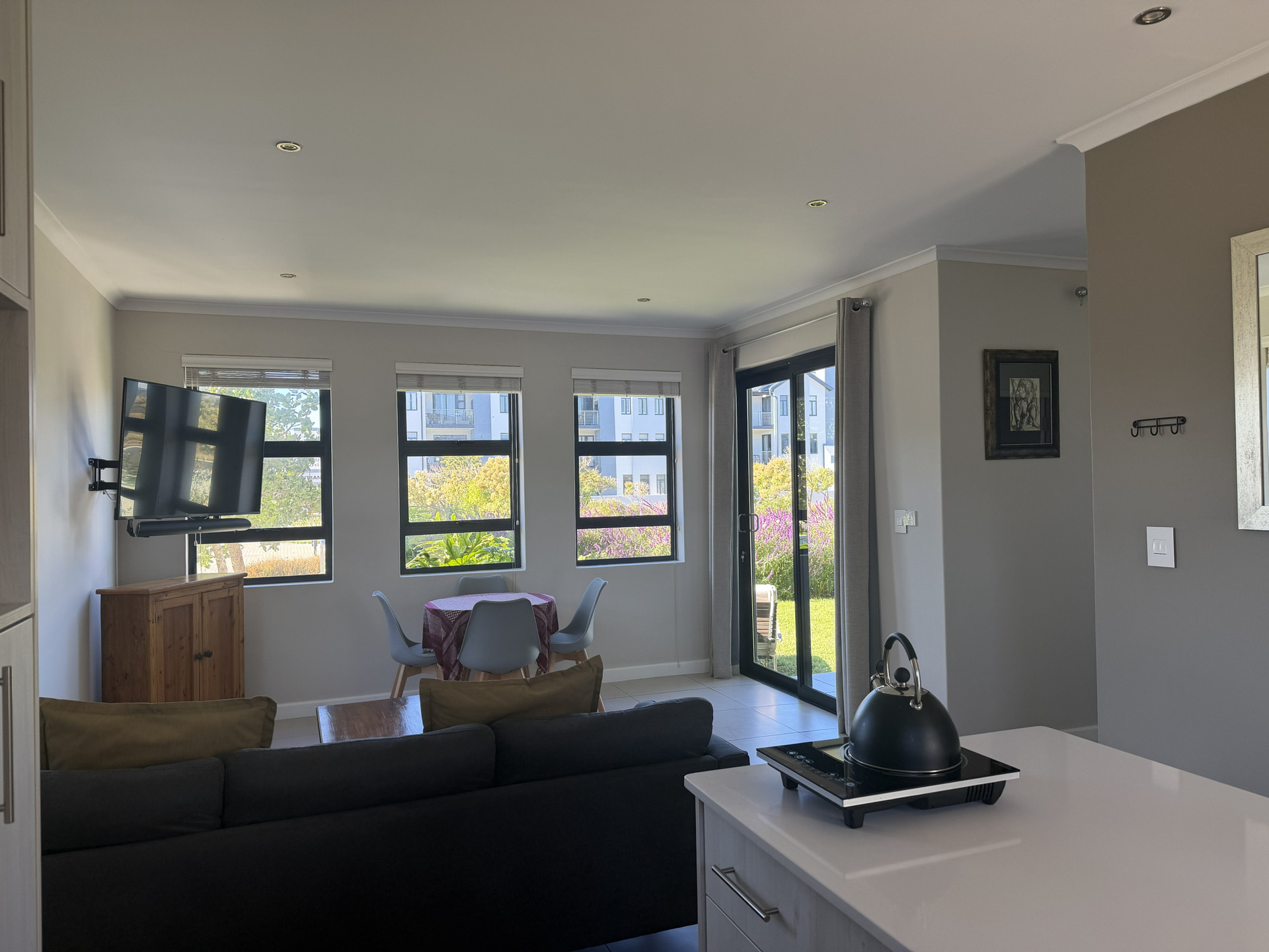 Living area with TV and dining