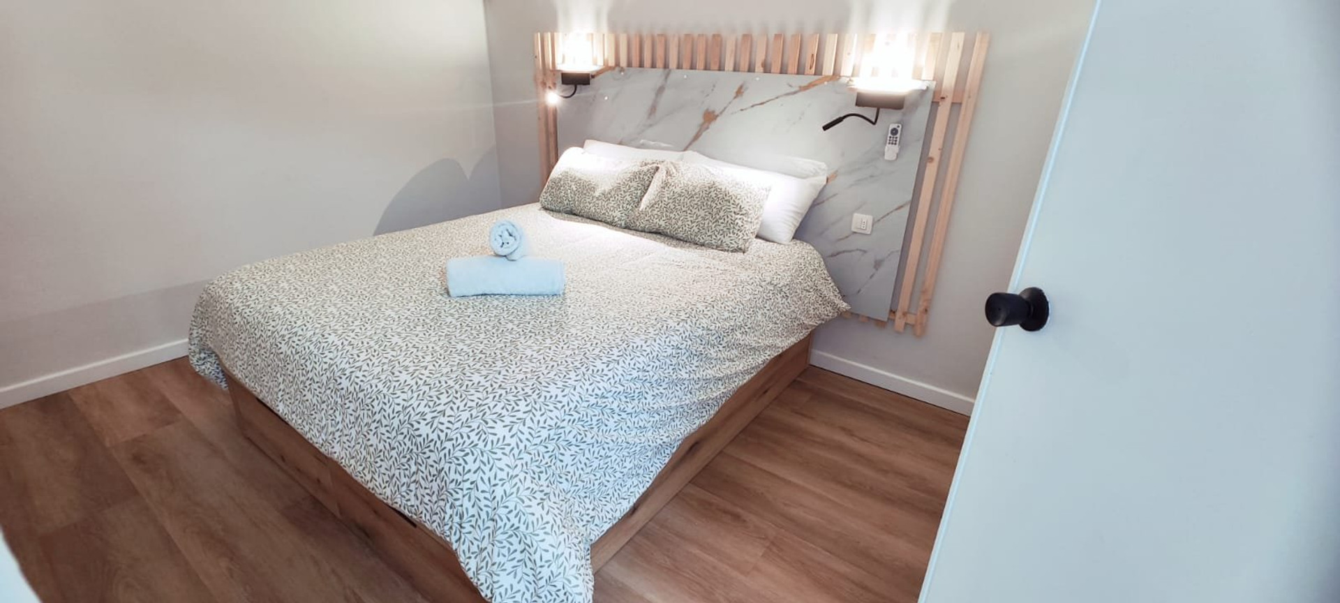 Cozy bedroom with marble headboard