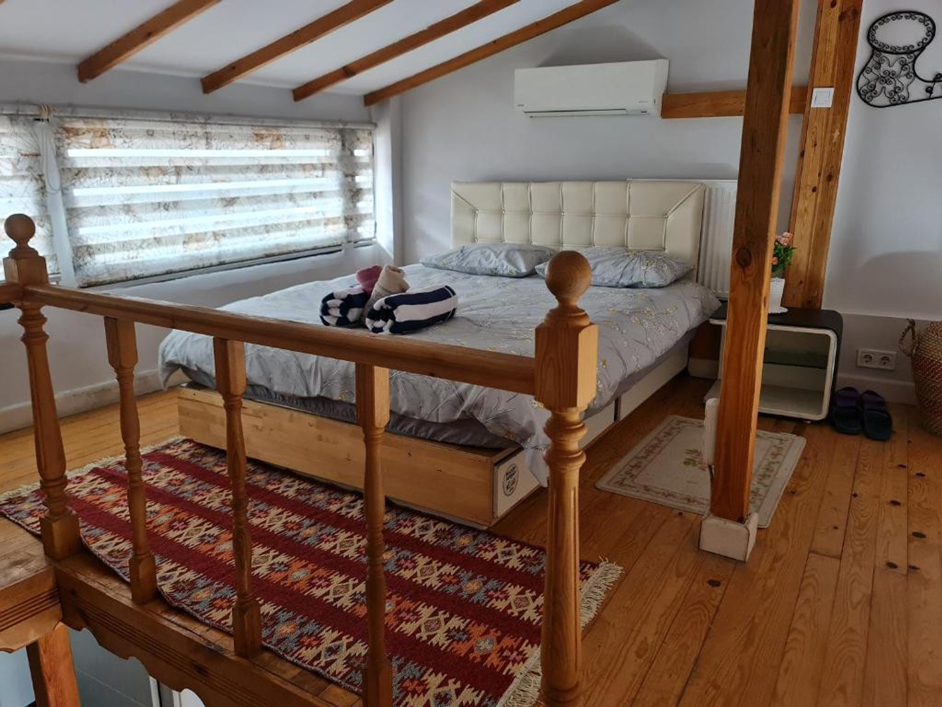 Loft bedroom with wooden beams