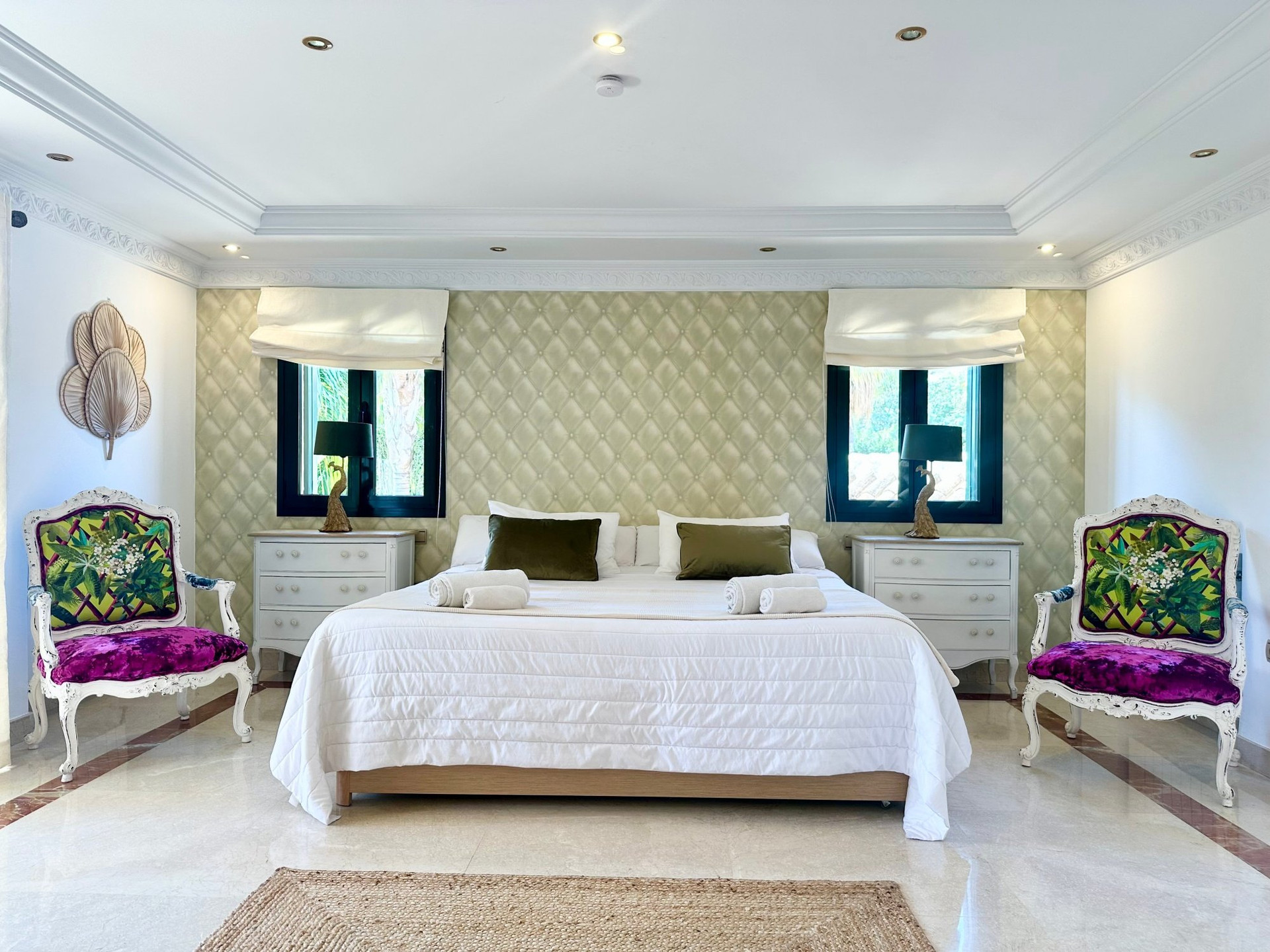 Master bedroom with upholstered wall