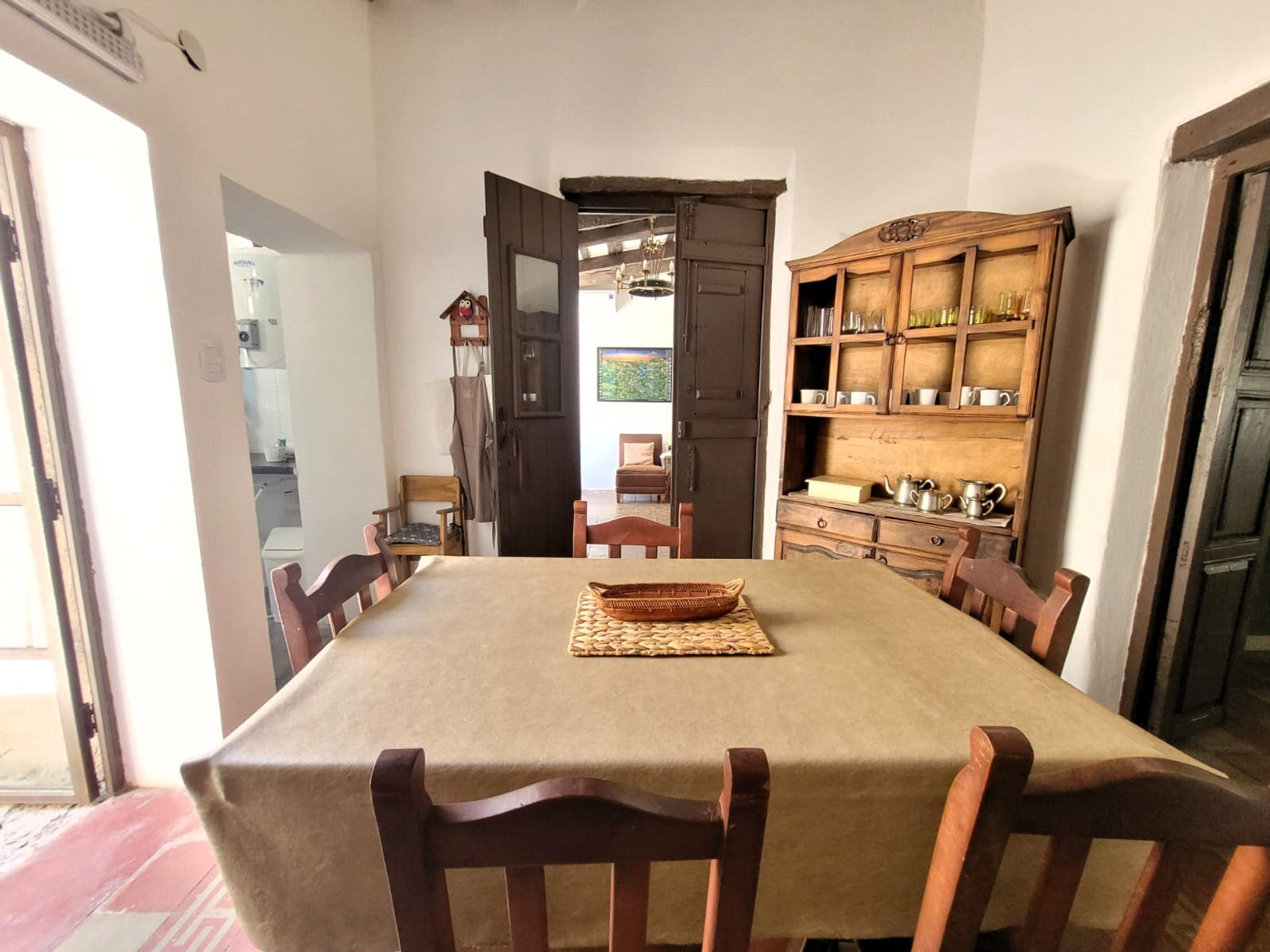 Dining area with wooden hutch