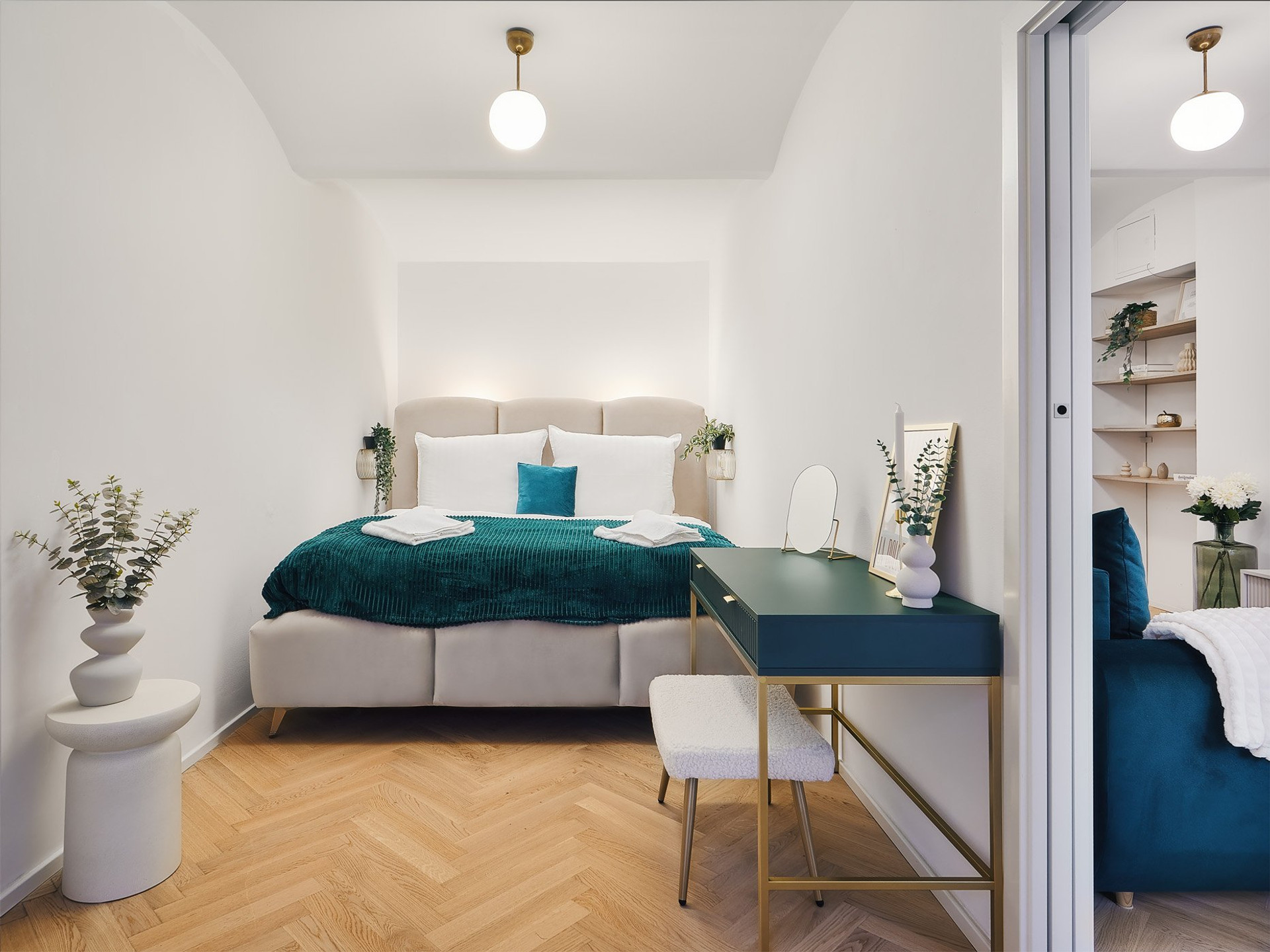 Bedroom with desk and herringbone floor