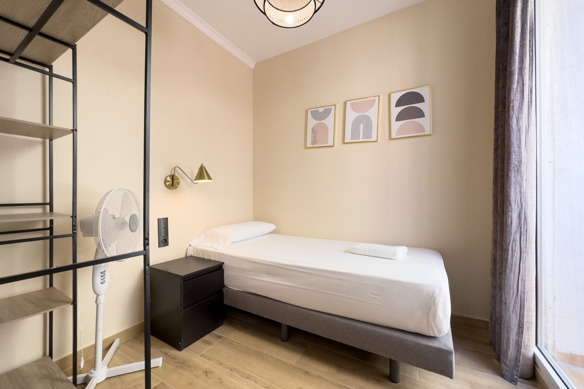 Single bedroom with wall art