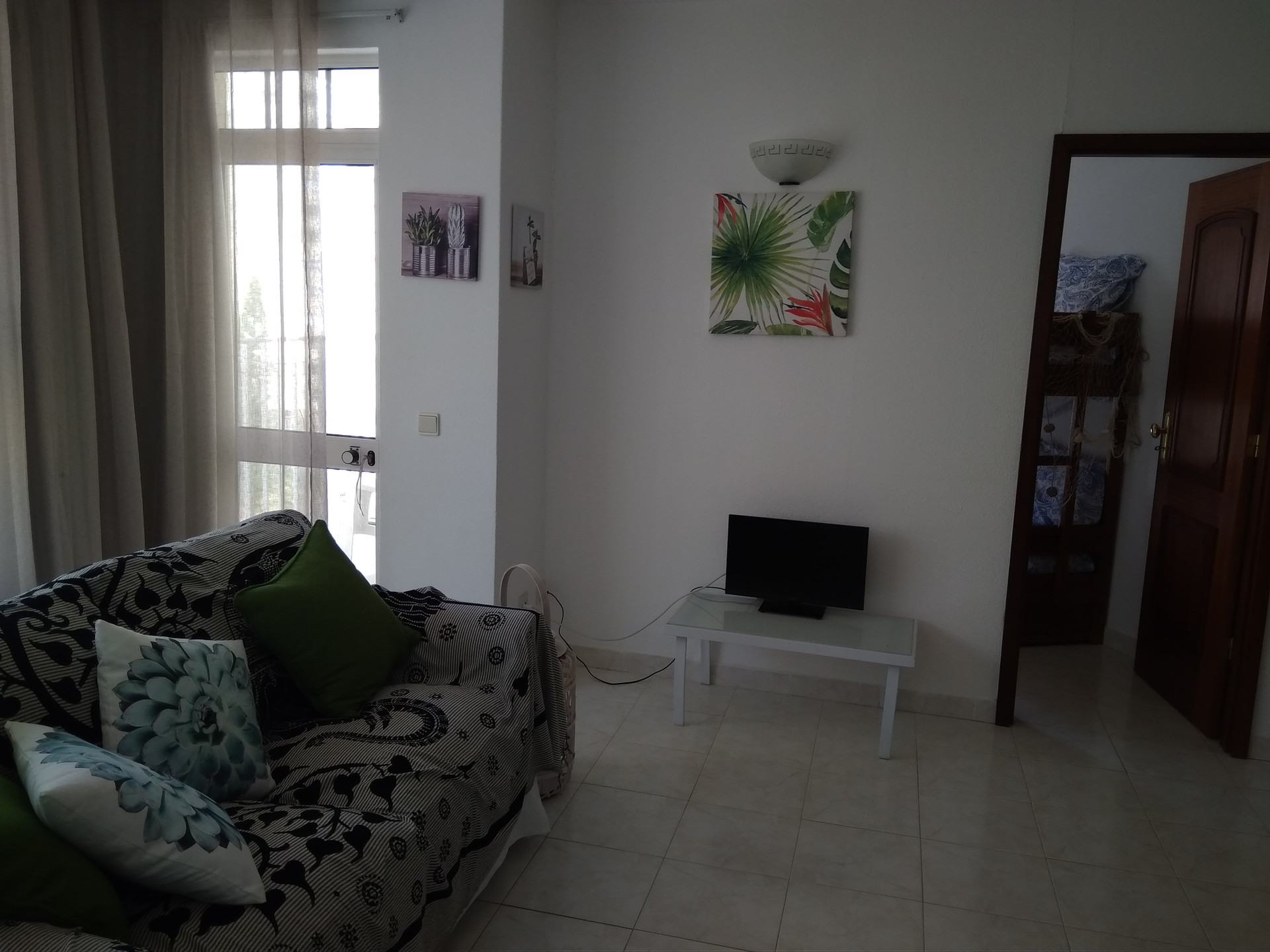 Living room with sofa and TV