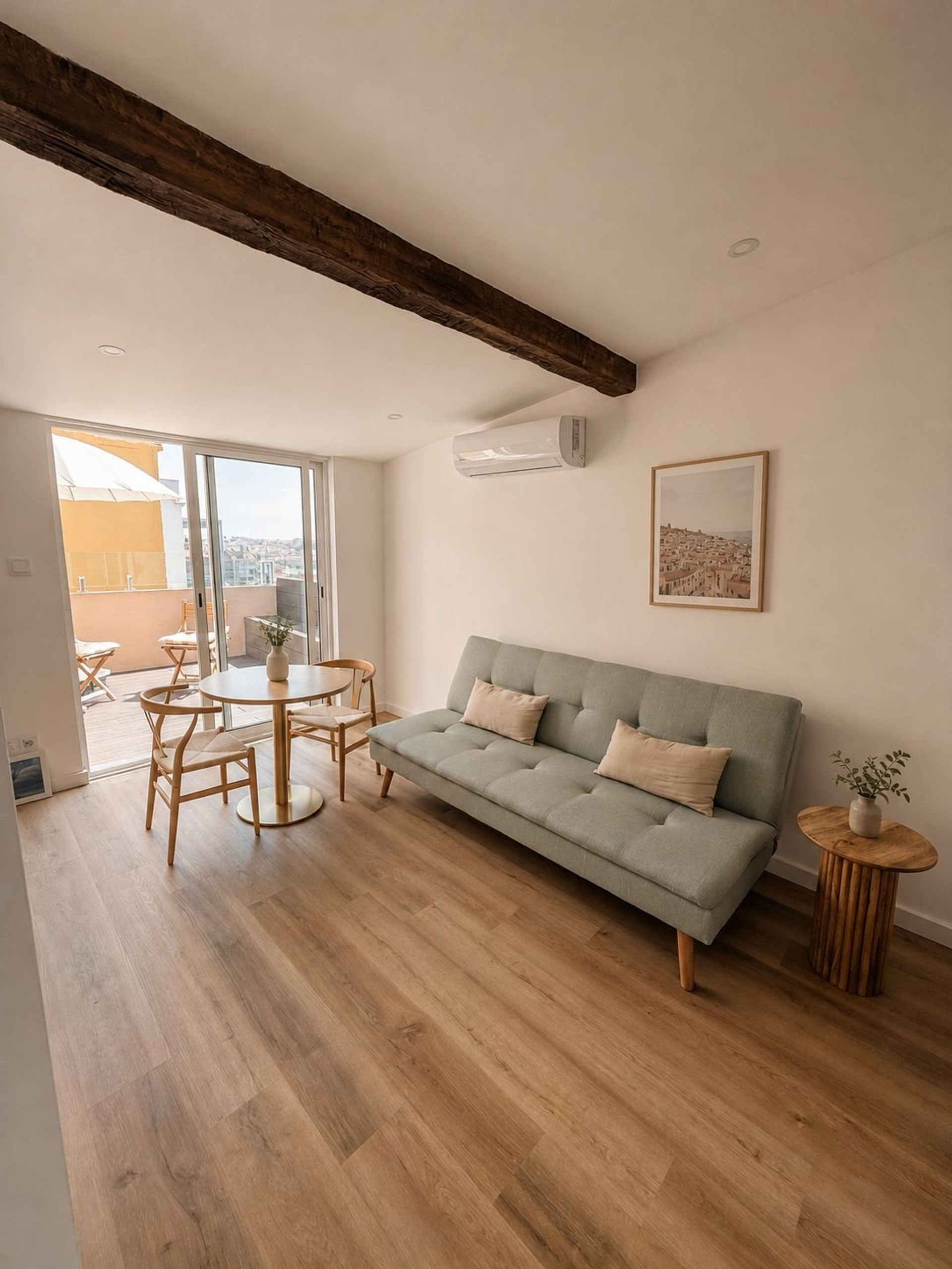 Living room with sofa and terrace access