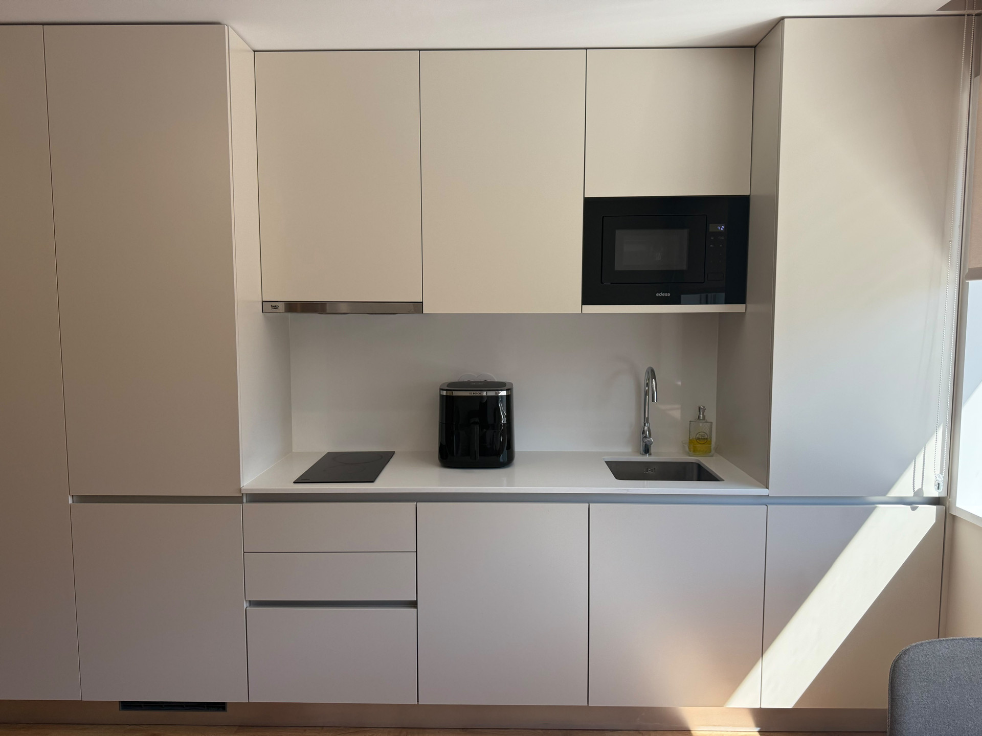 Kitchen cabinetry with microwave