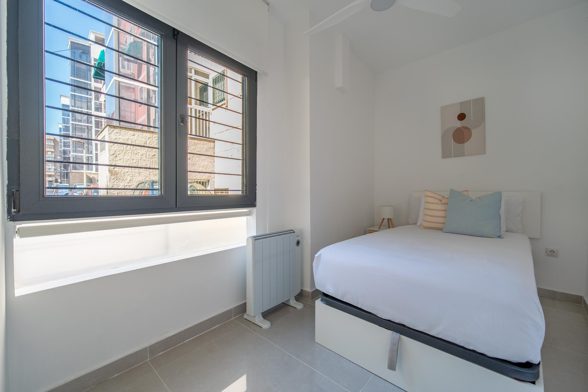 Bedroom with window and radiator
