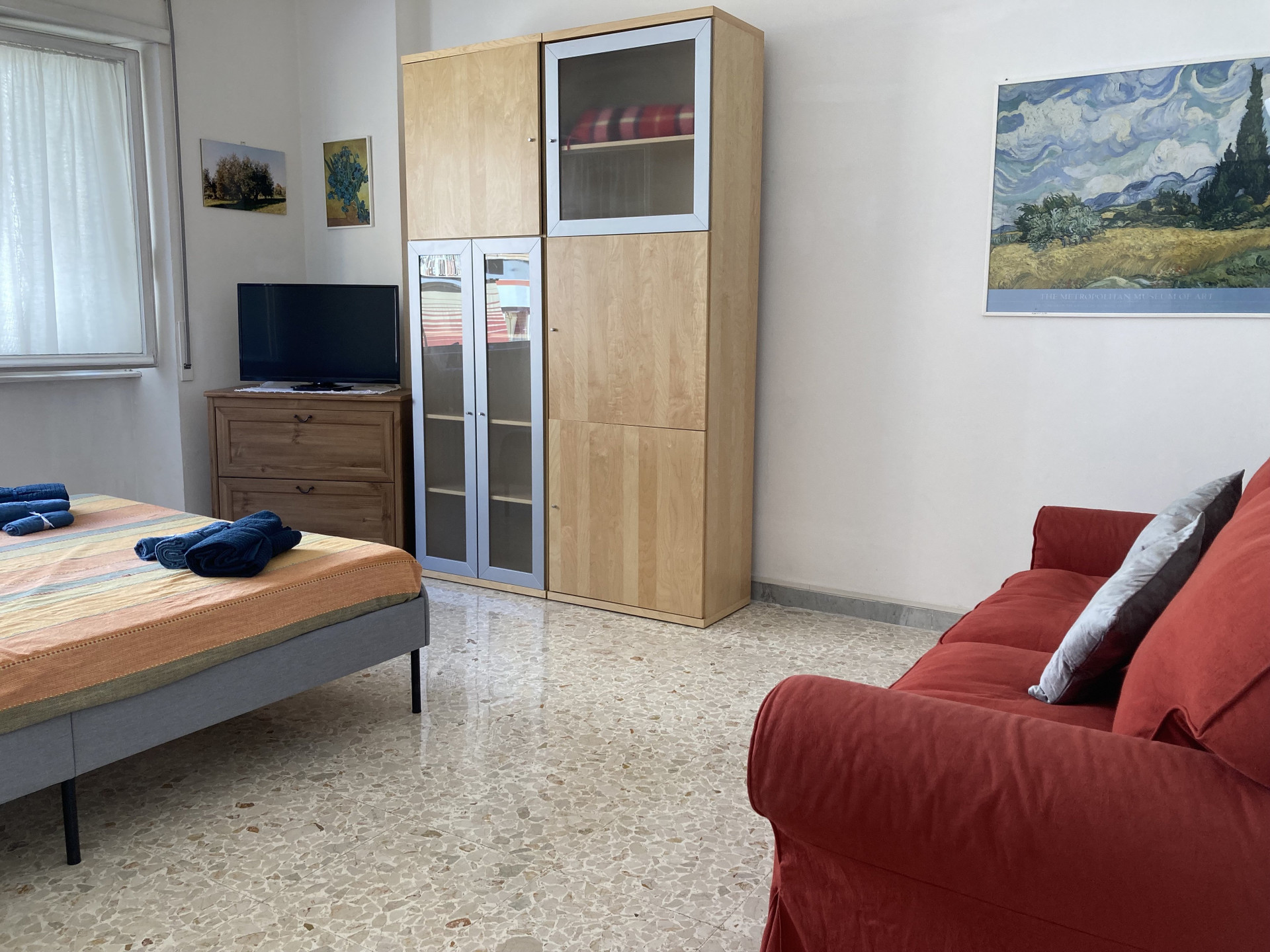 Living area with wardrobe and sofa