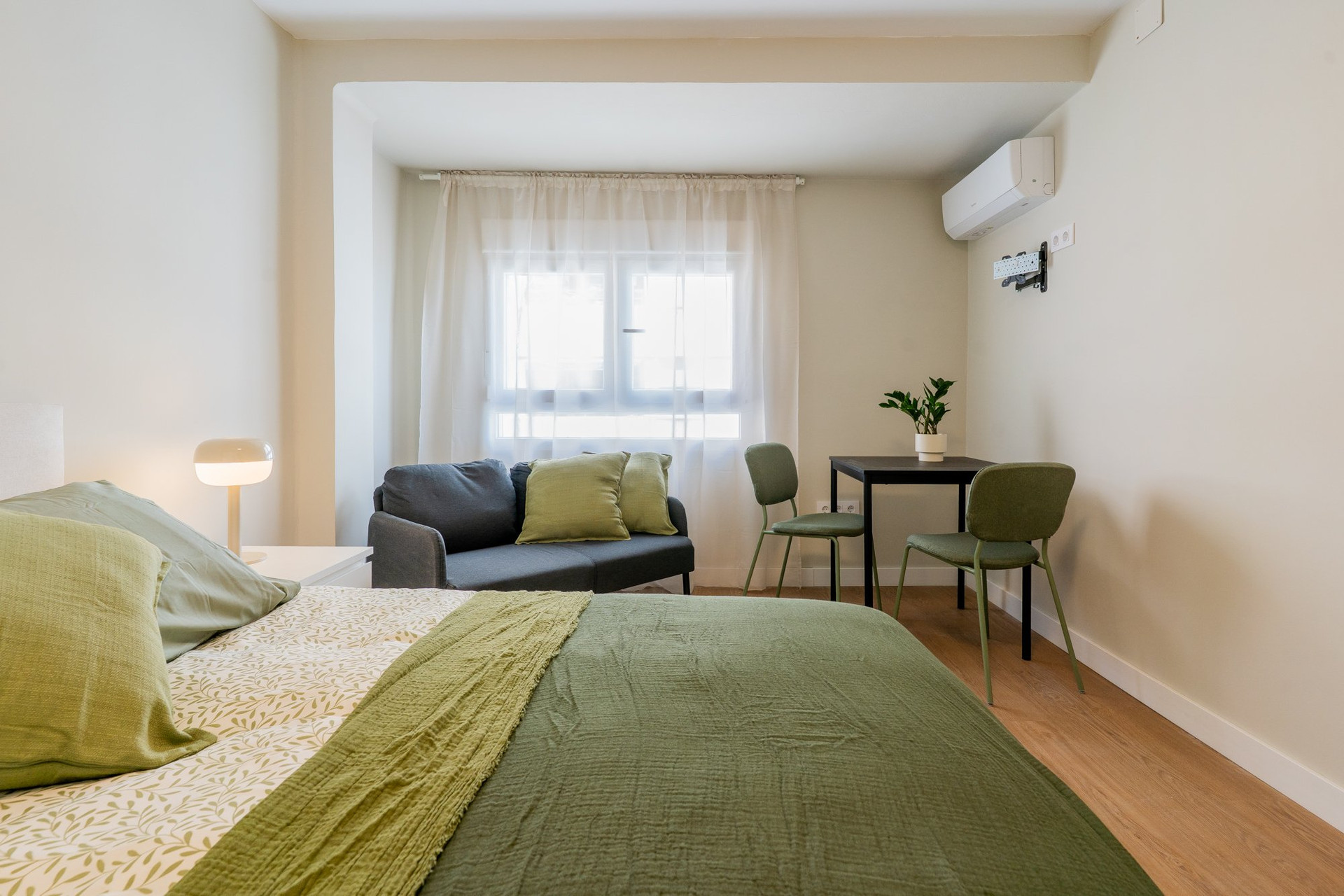 Studio with sofa and dining area