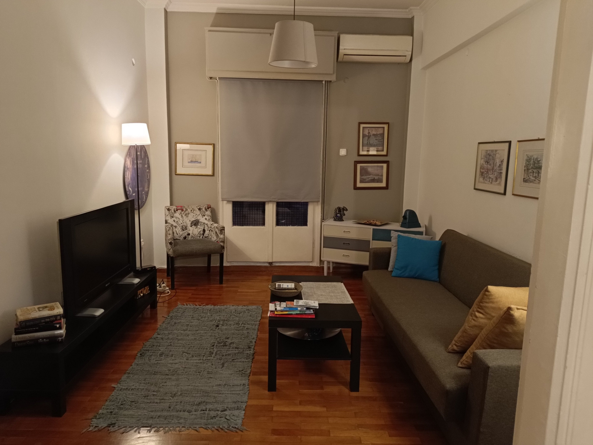 Living room with sofa and armchair