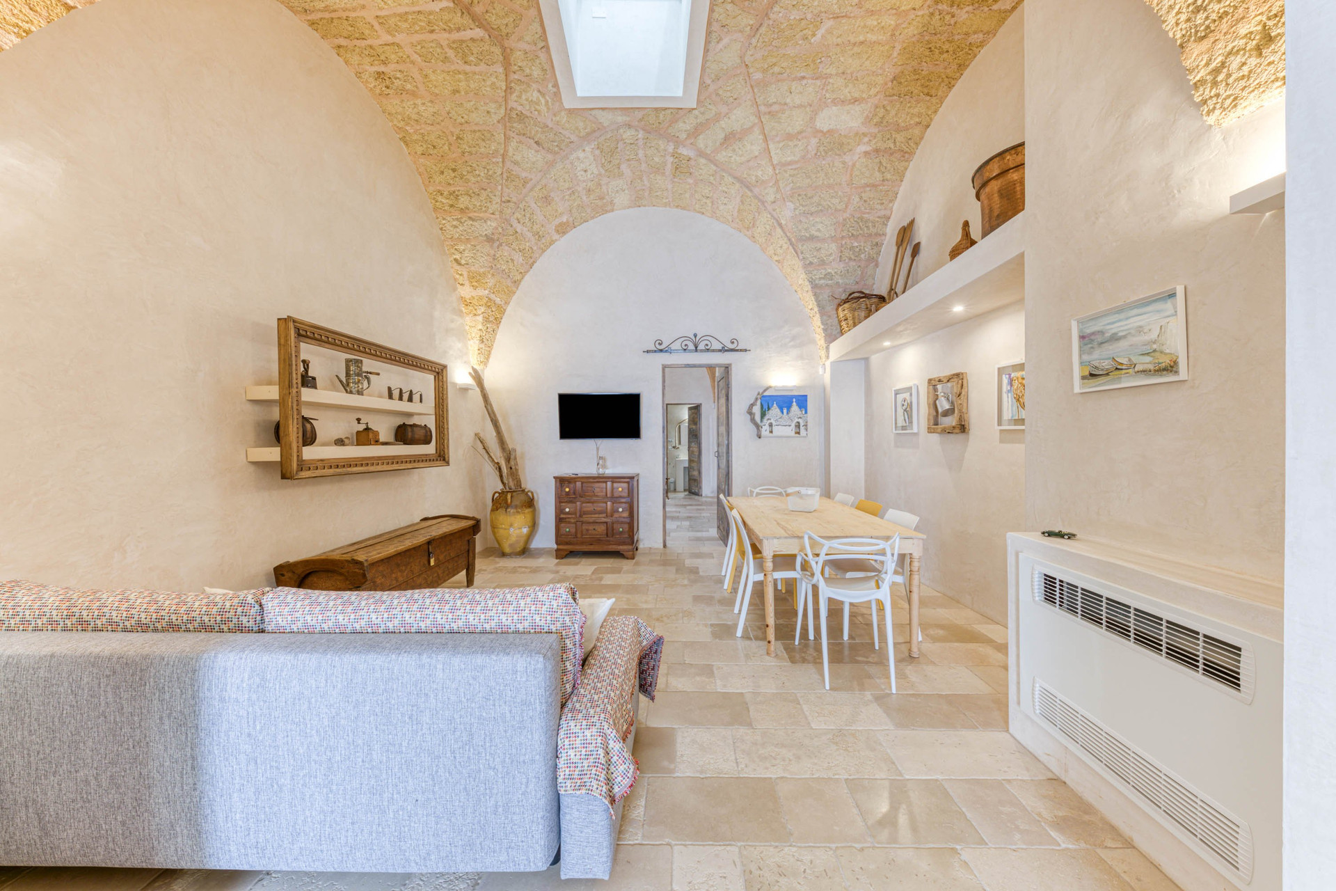 Living and dining area with vaults