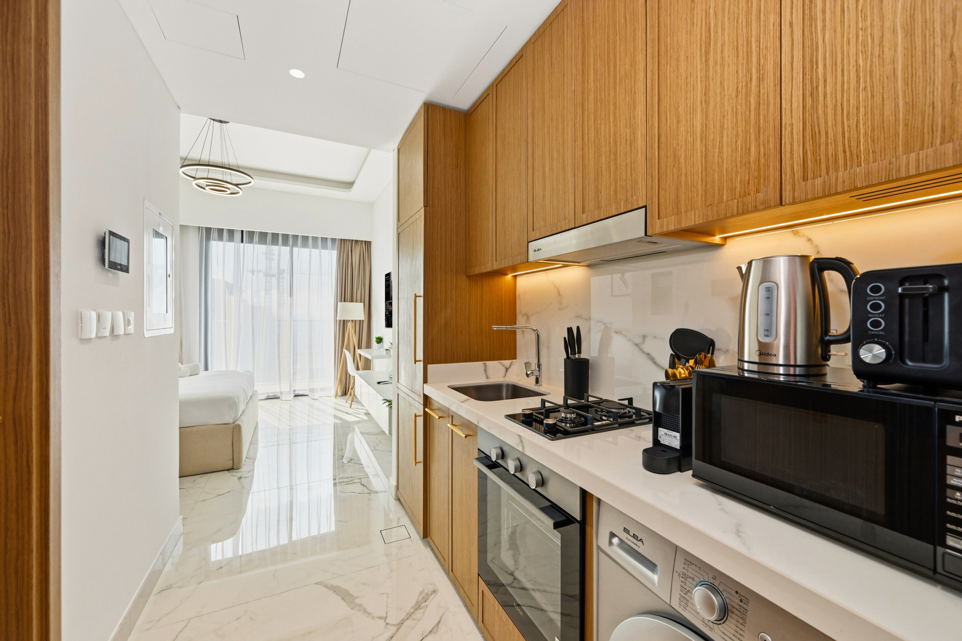 Kitchen with view to bedroom