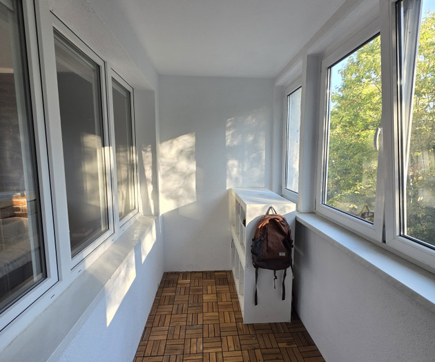 Balcony with storage shelf