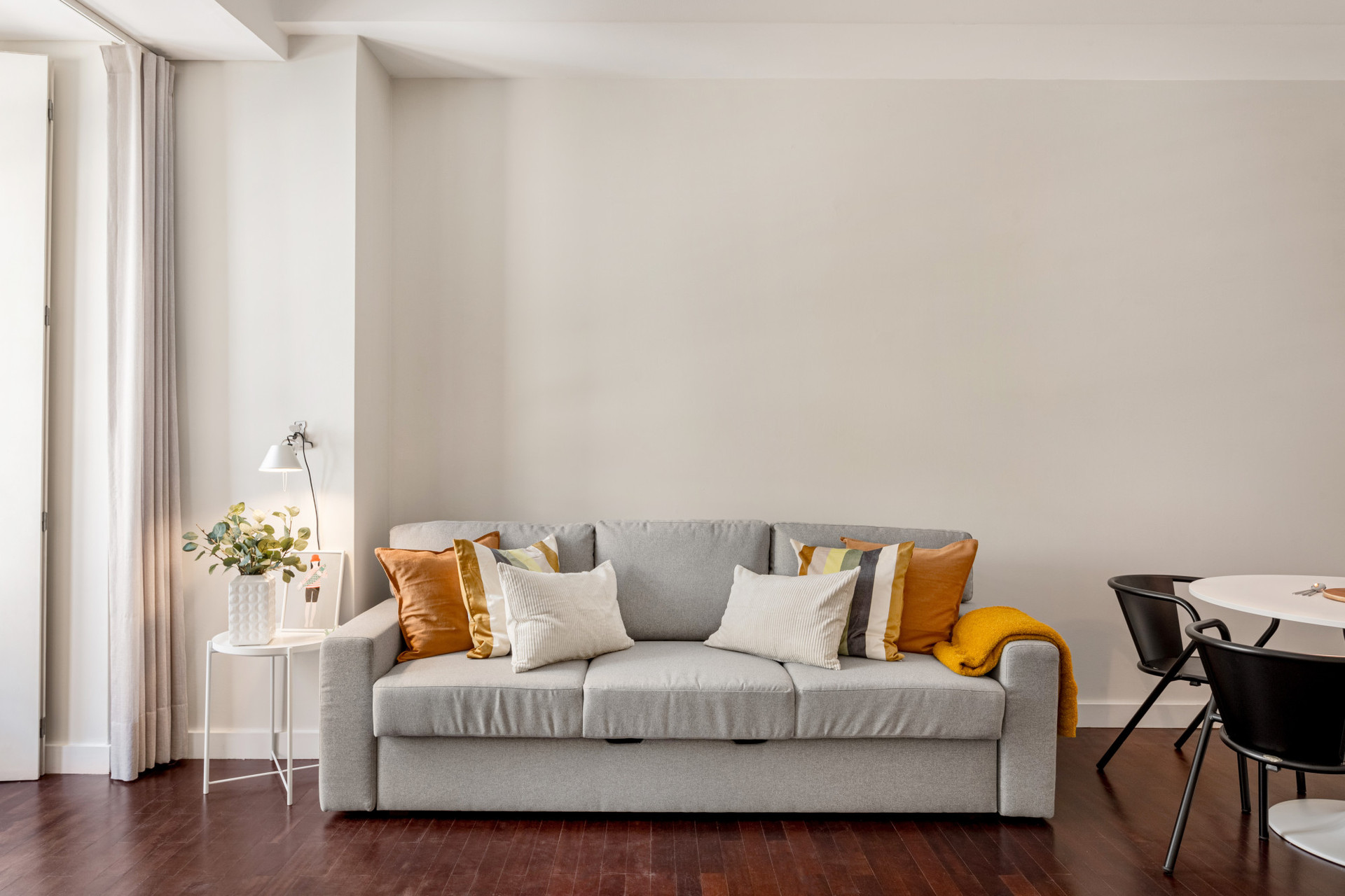 Living Room with Sofa and Dining Table