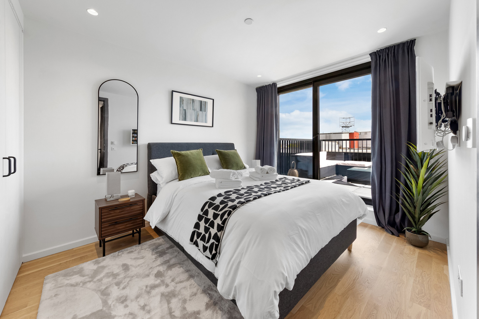 Master bedroom with balcony access