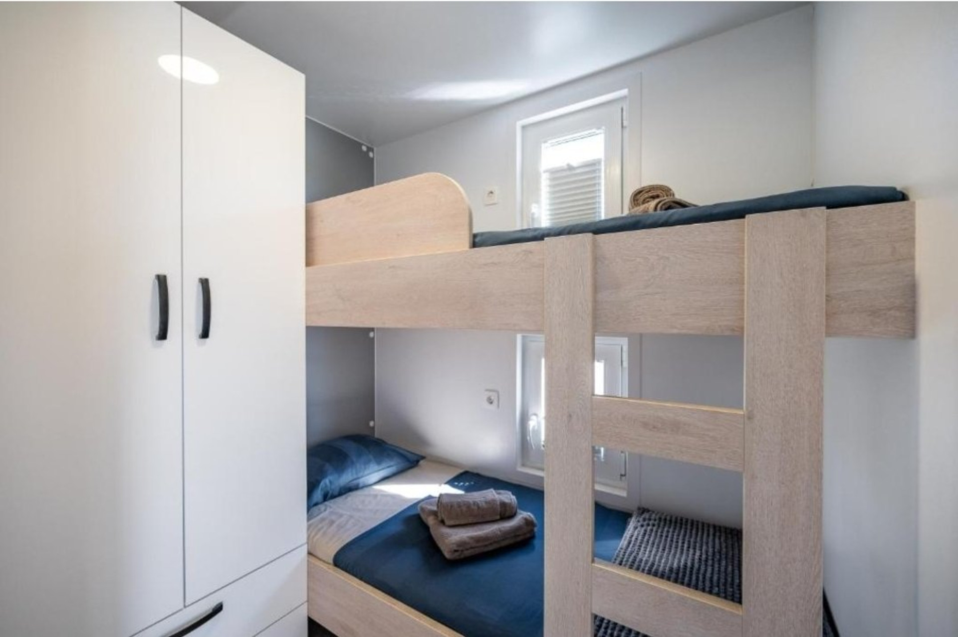 Bunk bed bedroom with wardrobe