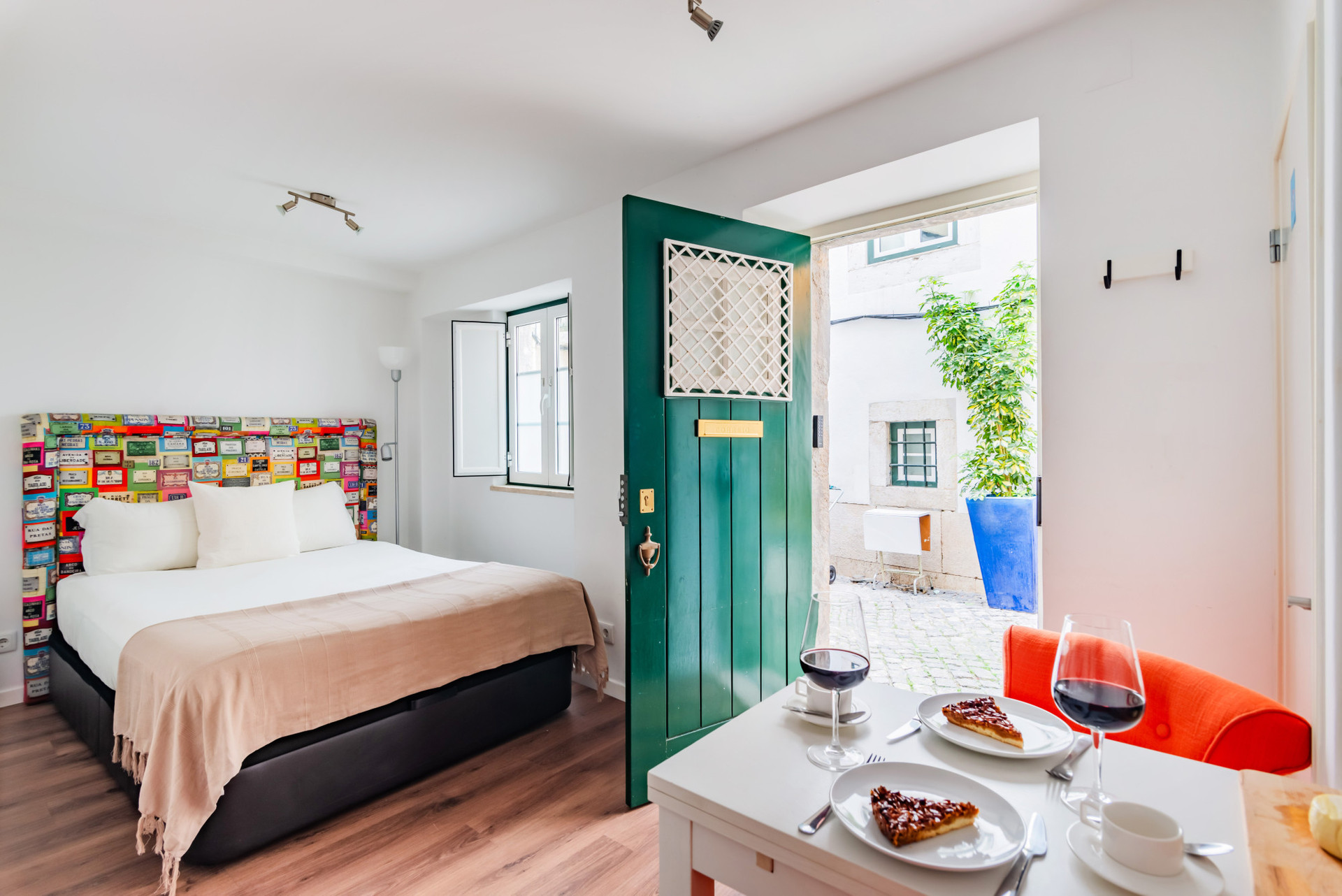 Sleeping area and dining table. Note that the apartment opens directly onto the street.