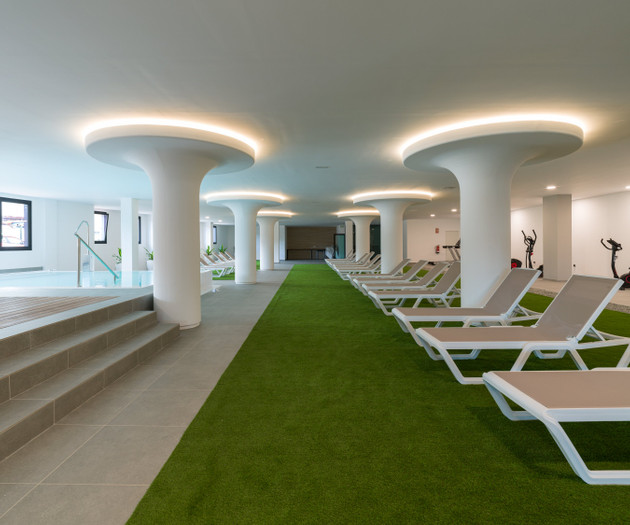 Indoor pool with loungers